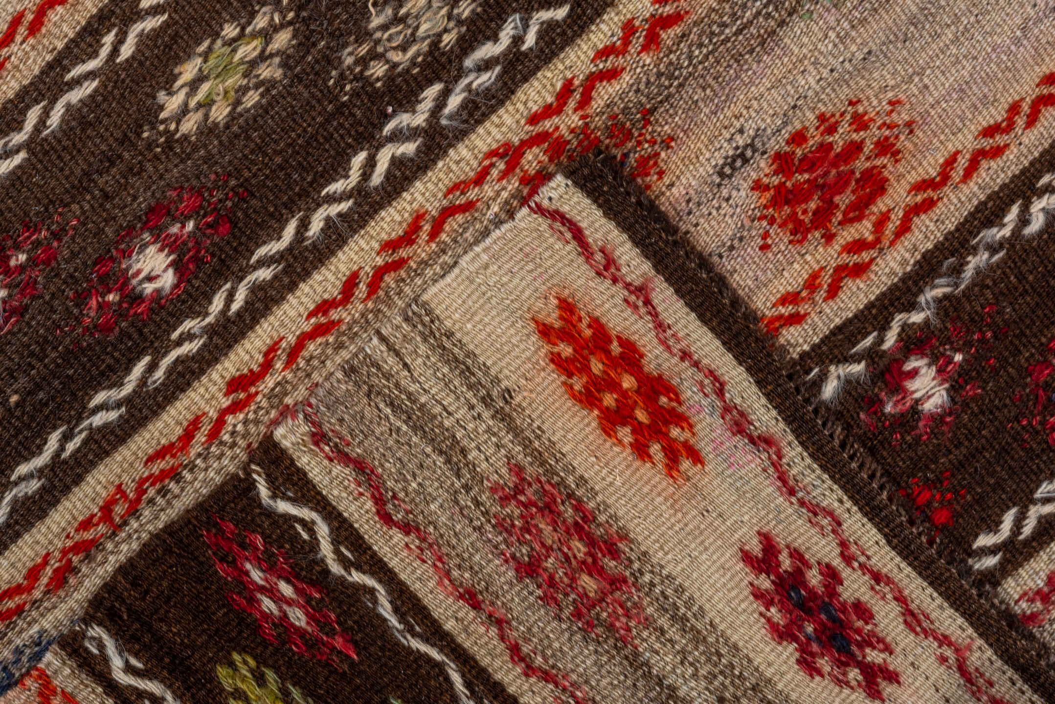 2' x 3' one-of-a-kind handmade vintage Jijim small size rug. Color palette: ivory, brown, rust, crimson, blue, olive, orange