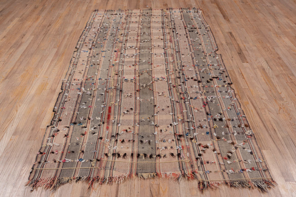 5' x 9' one-of-a-kind handmade vintage Kilim medium size rug. Color palette: taupe, brown, blush, charcoal, ivory, rust