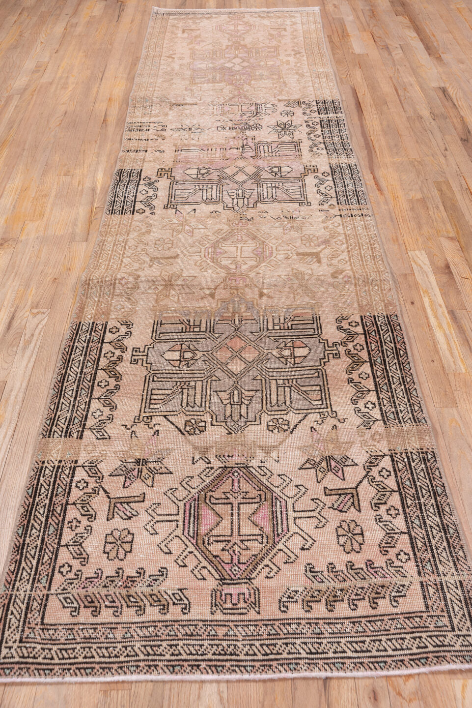 3' x 12' one-of-a-kind handmade vintage Heriz runner rug. Color palette: brown, gray, light gray, off-white, pink, snow