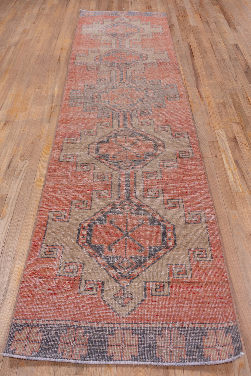 2' x 11' one-of-a-kind handmade vintage Oushak runner rug. Color palette: brown, gray, off-white, pink, red, snow, white