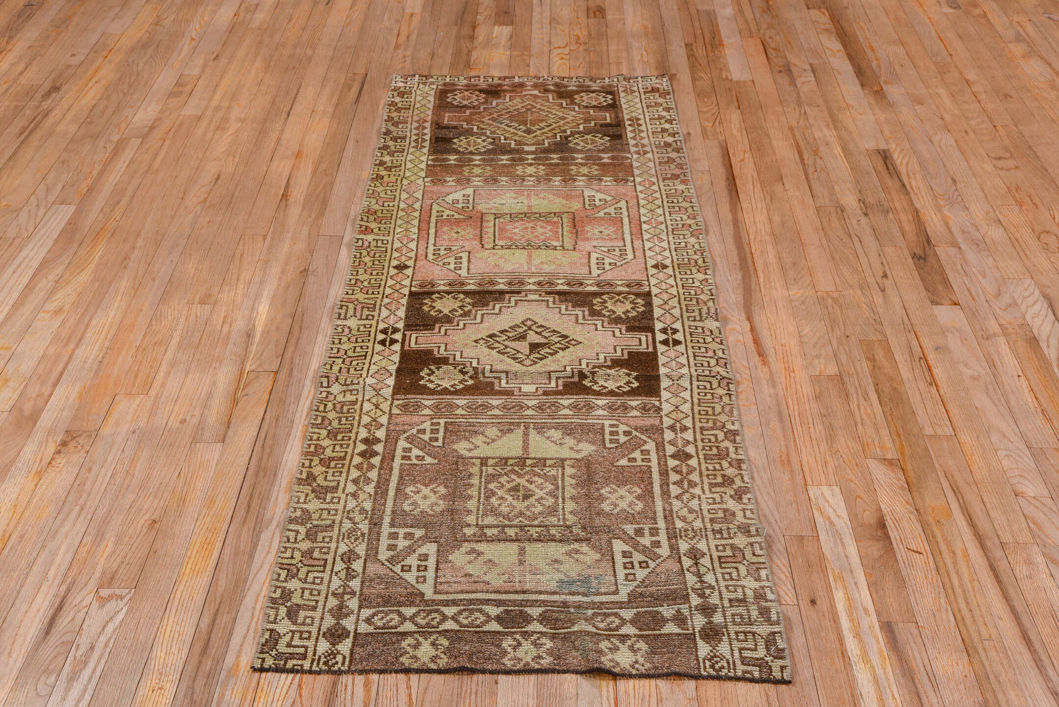 2' x 7' one-of-a-kind handmade vintage Oushak runner rug. Color palette: brown, ivory, taupe, blush, camel, rose, beige