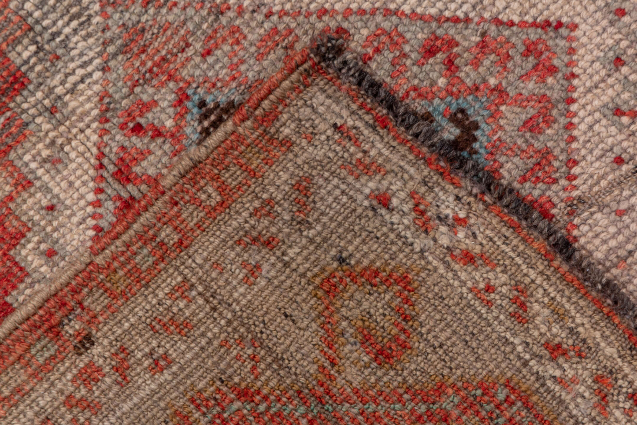 4' x 11' one-of-a-kind handmade vintage Oushak runner rug. Color palette: brown, gray, pink, red