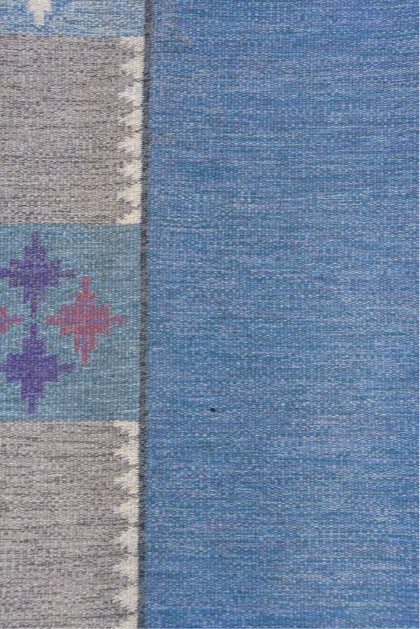 6' x 9' one-of-a-kind handmade vintage Rollaken medium size rug. Color palette: blue, gray, light blue, light gray