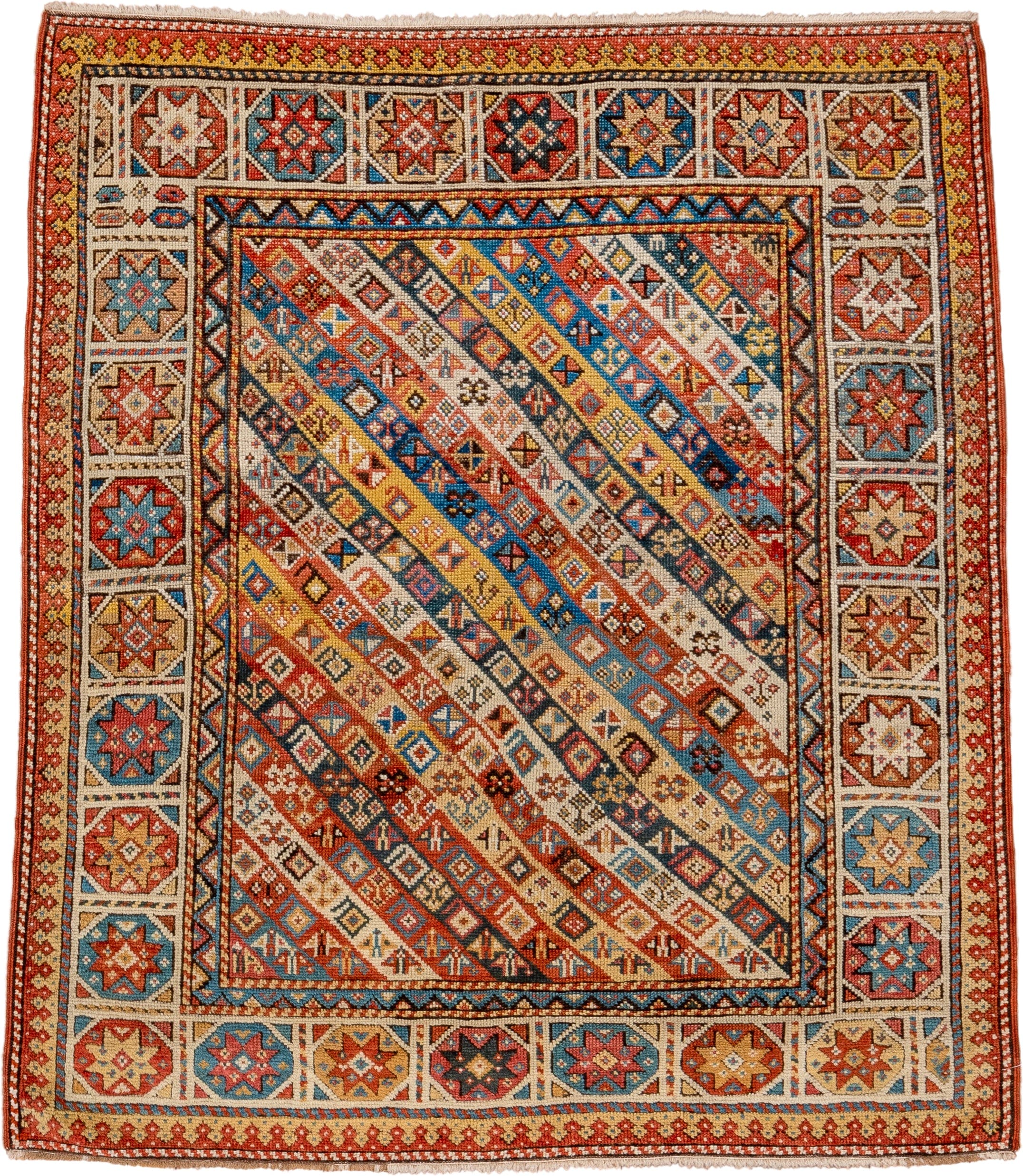 3' x 4' one-of-a-kind handmade antique Kazak small size rug. Color palette: ivory, rust, sky_blue, gold, navy, terra_cotta