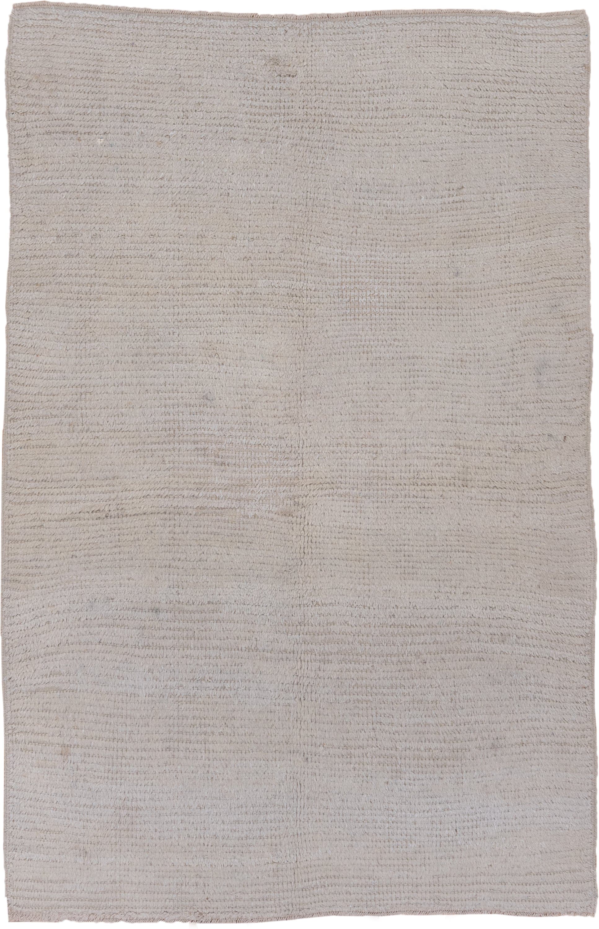 4' x 6' one-of-a-kind handmade antique Tulu small size rug. Color palette: ivory, cream, taupe, beige, gray