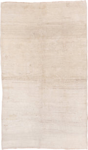 5' x 8' one-of-a-kind handmade antique Tulu medium size rug. Color palette: ivory, cream, beige, taupe, gray