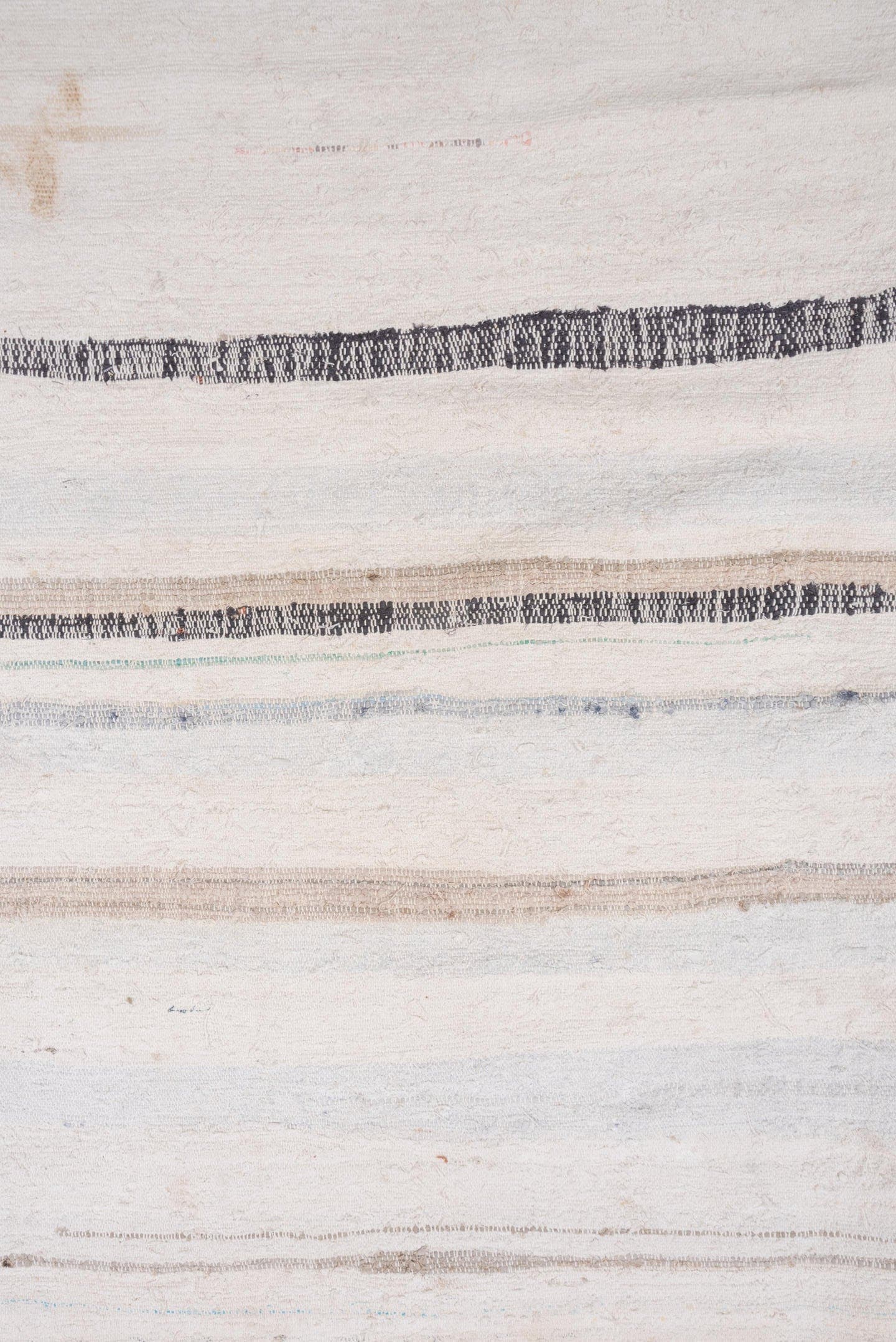 6' x 7' one-of-a-kind handmade antique Rag Rug rug. Color palette: ivory, cream, charcoal, slate, faded blue, taupe, gray
