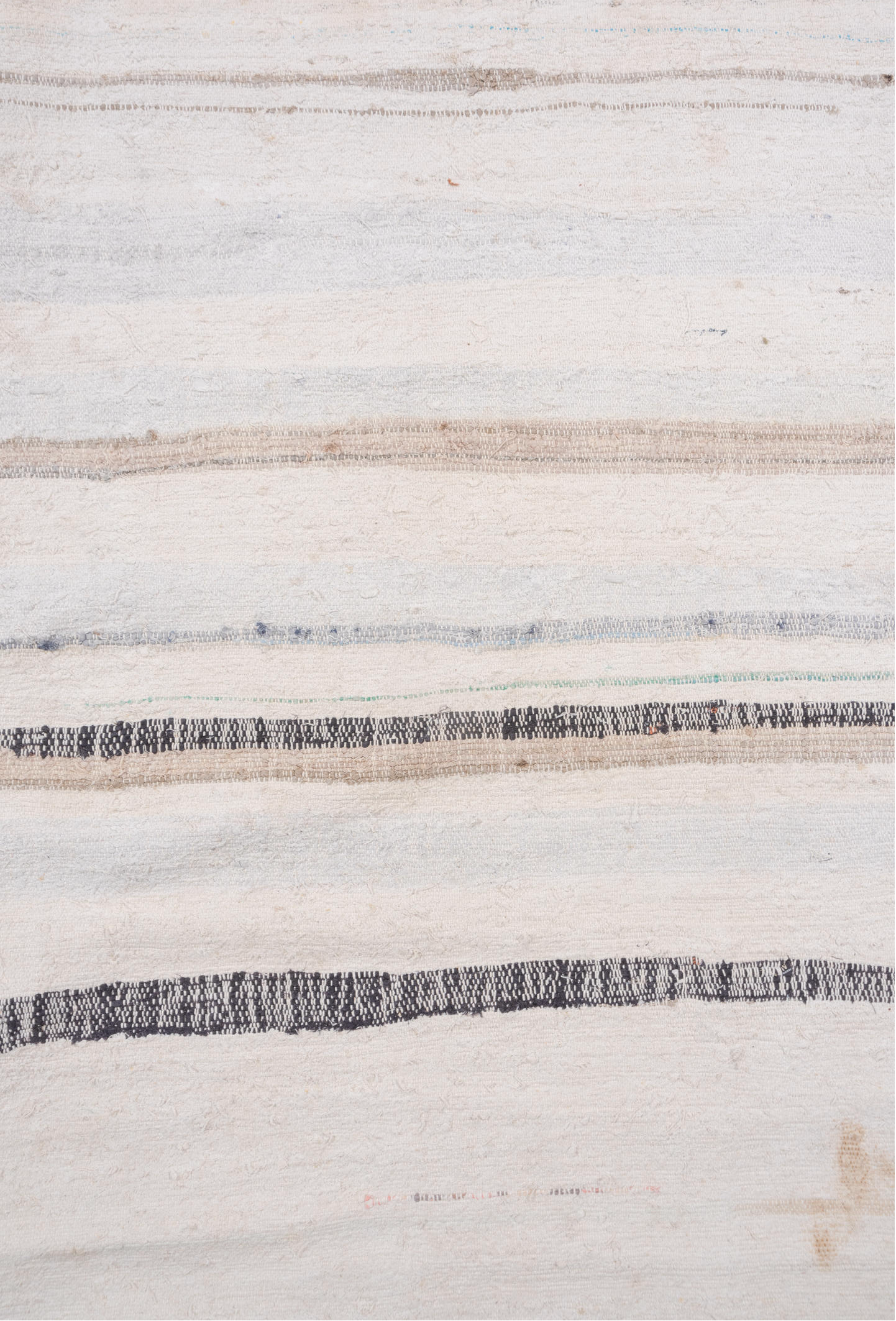 6' x 7' one-of-a-kind handmade antique Rag Rug rug. Color palette: ivory, cream, charcoal, slate, faded blue, taupe, gray