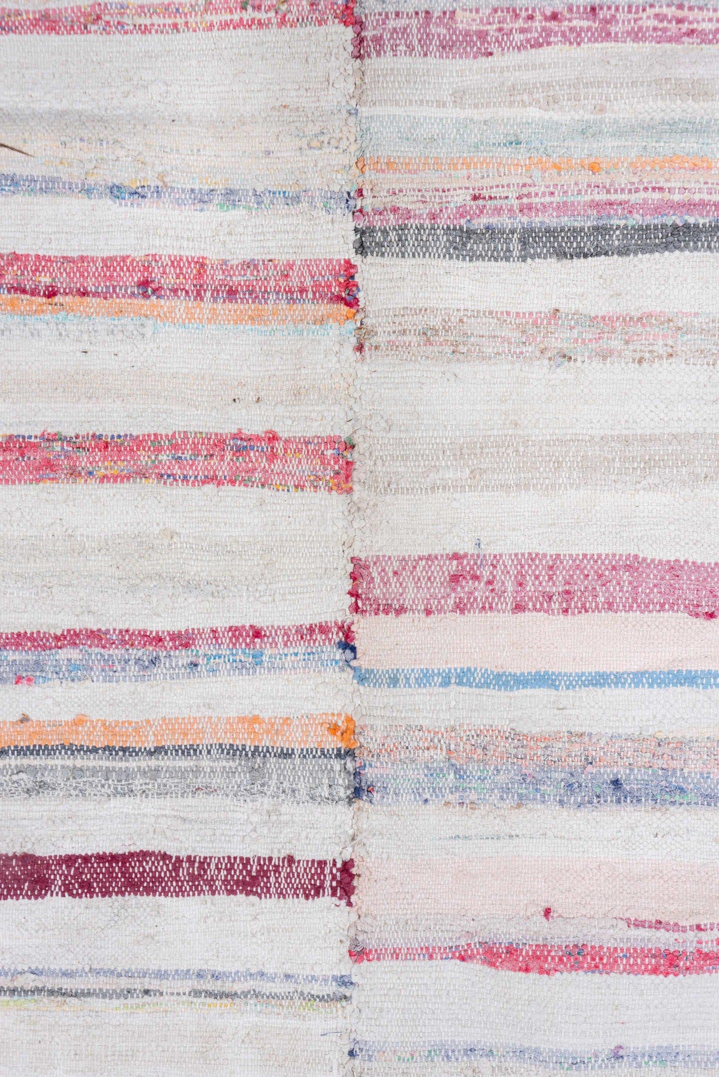 7' x 8' one-of-a-kind handmade antique Rag Rug rug. Color palette: ivory, rose, pale blue, peach, gray, tan, pink, red
