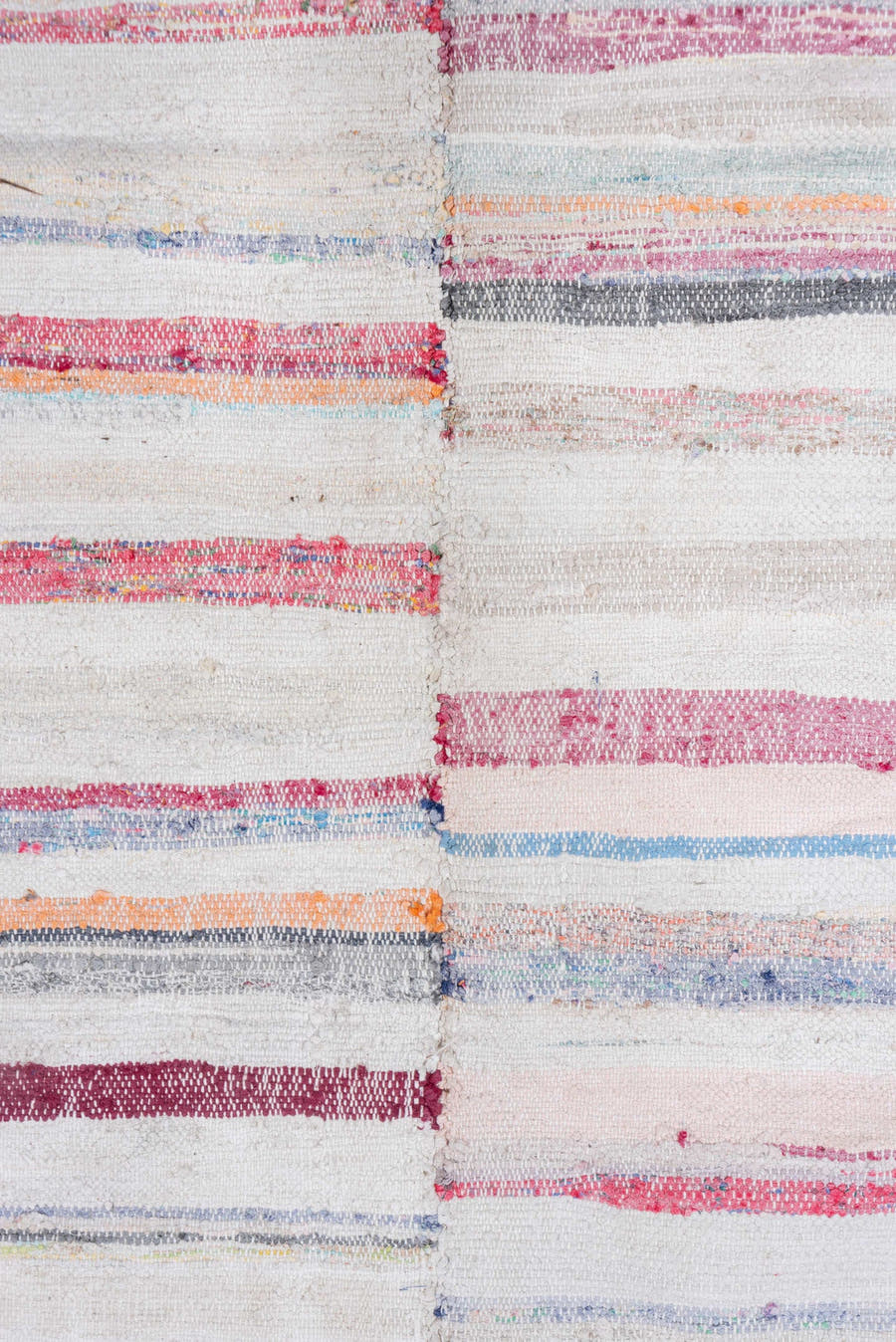 7' x 8' one-of-a-kind handmade antique Rag Rug rug. Color palette: ivory, rose, pale blue, peach, gray, tan, pink, red