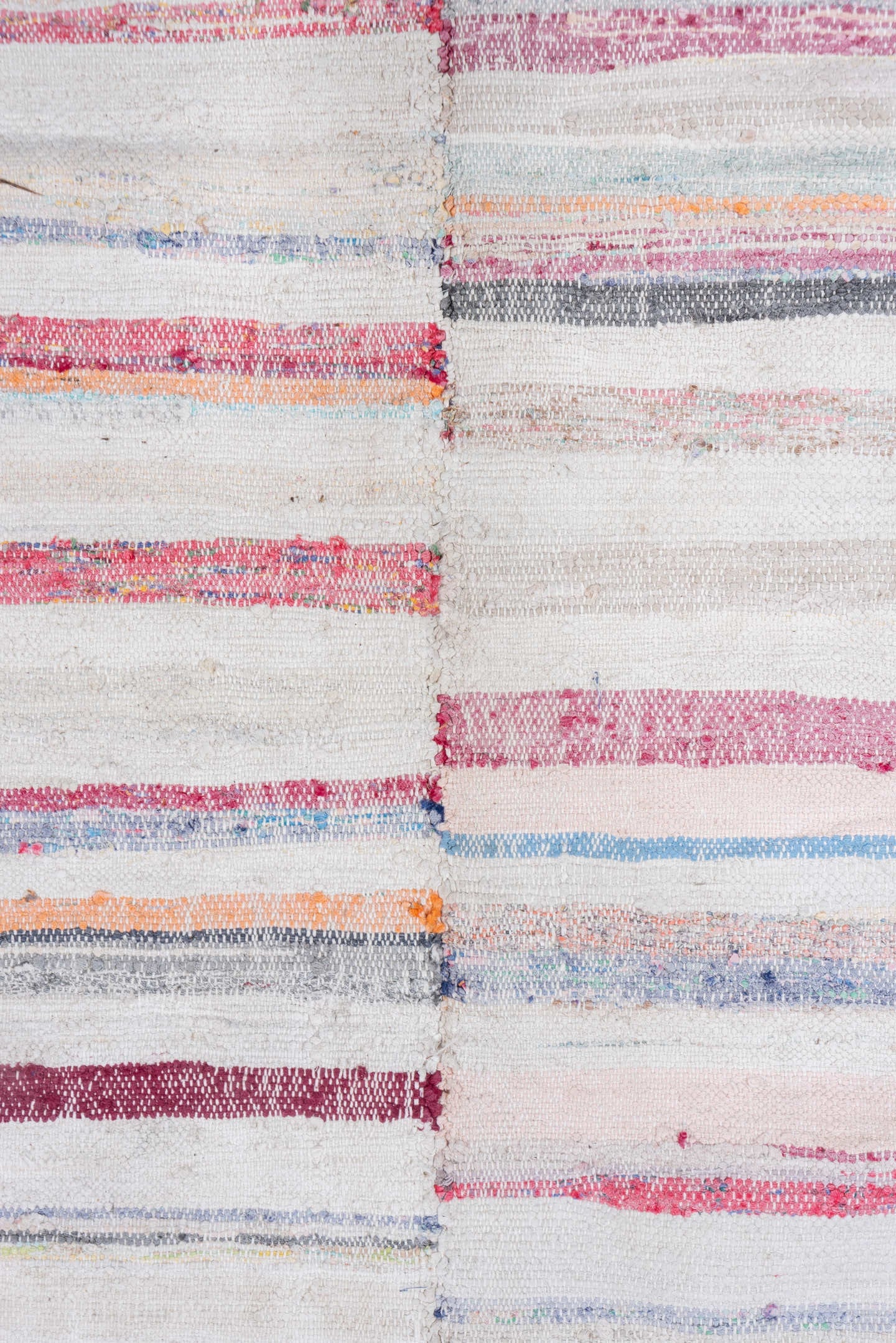7' x 8' one-of-a-kind handmade antique Rag Rug rug. Color palette: ivory, rose, pale blue, peach, gray, tan, pink, red