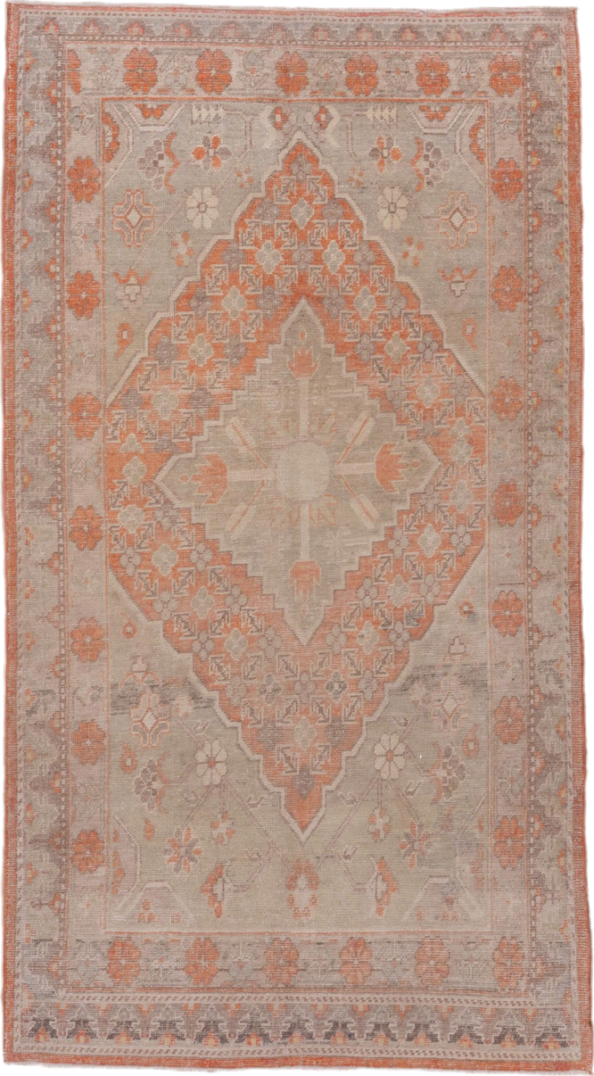4' x 7' one-of-a-kind handmade antique Khotan rug. Color palette: taupe, coral, ivory, pewter, rose, camel, beige, gray