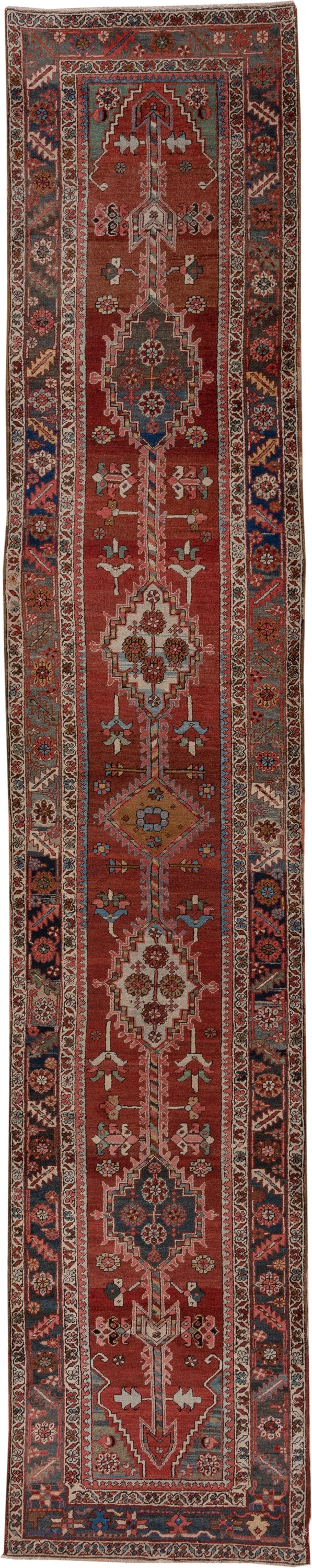 3' x 15' one-of-a-kind handmade antique Serapi runner rug. Color palette: rust, indigo, ivory, slate, rose, camel, navy