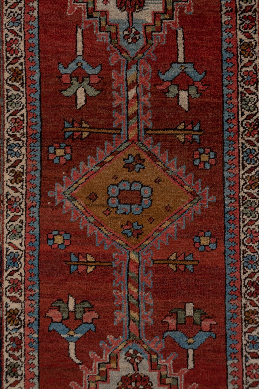 3' x 15' one-of-a-kind handmade antique Serapi runner rug. Color palette: rust, indigo, ivory, slate, rose, camel, navy