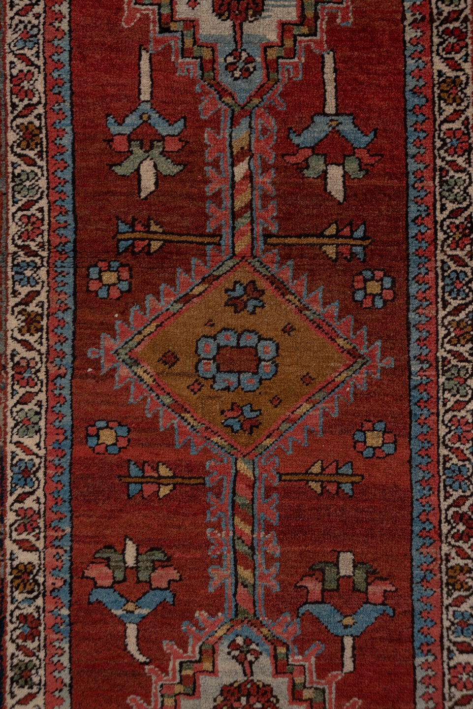 3' x 15' one-of-a-kind handmade antique Serapi runner rug. Color palette: rust, indigo, ivory, slate, rose, camel, navy