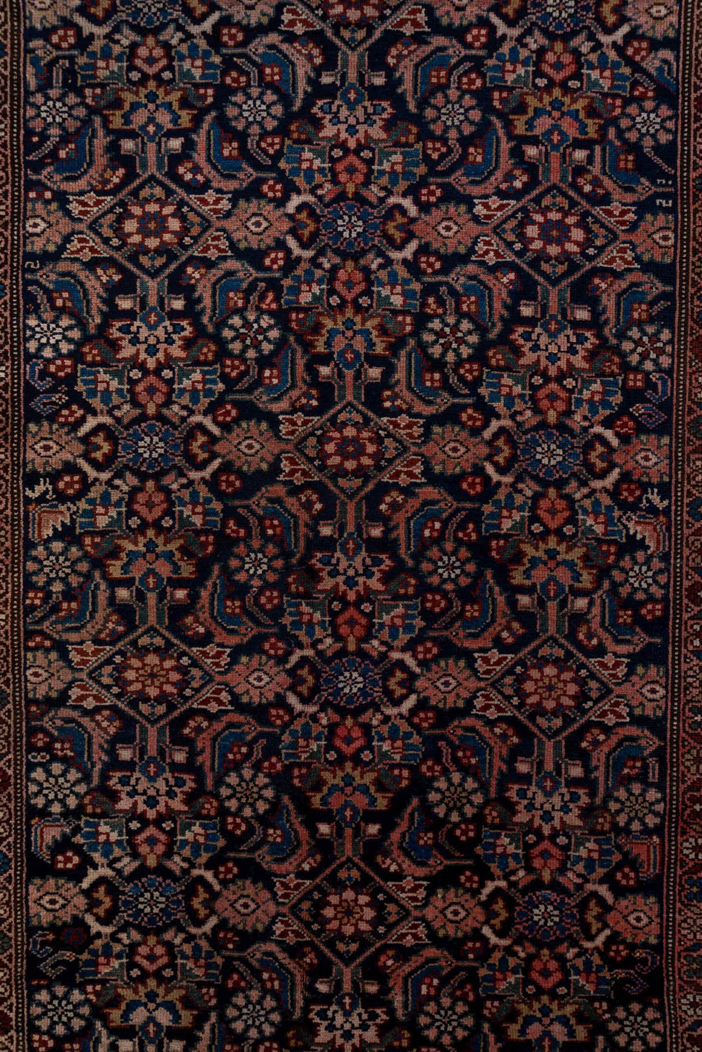 5' x 14' one-of-a-kind handmade antique Malayer rug. Color palette: navy, ivory, rust, indigo, camel, rose, sienna, blue
