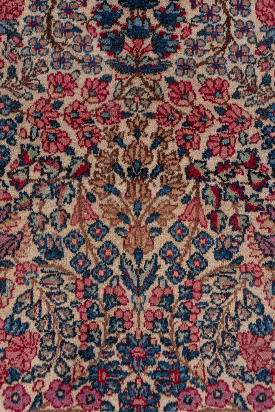 2' x 10' one-of-a-kind handmade antique Kerman runner rug. Color palette: ivory, navy, rose, dusty pink, rust, taupe