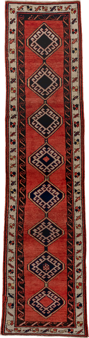 2' x 9' one-of-a-kind handmade antique Sarab runner rug. Color palette: terra cotta, ivory, navy, rust, charcoal, camel