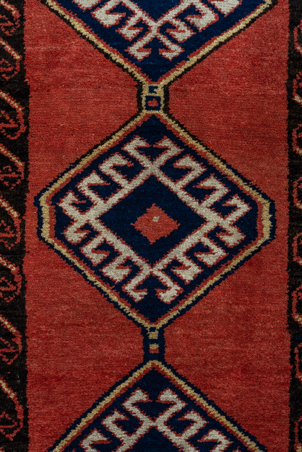 2' x 9' one-of-a-kind handmade antique Sarab runner rug. Color palette: terra cotta, ivory, navy, rust, charcoal, camel