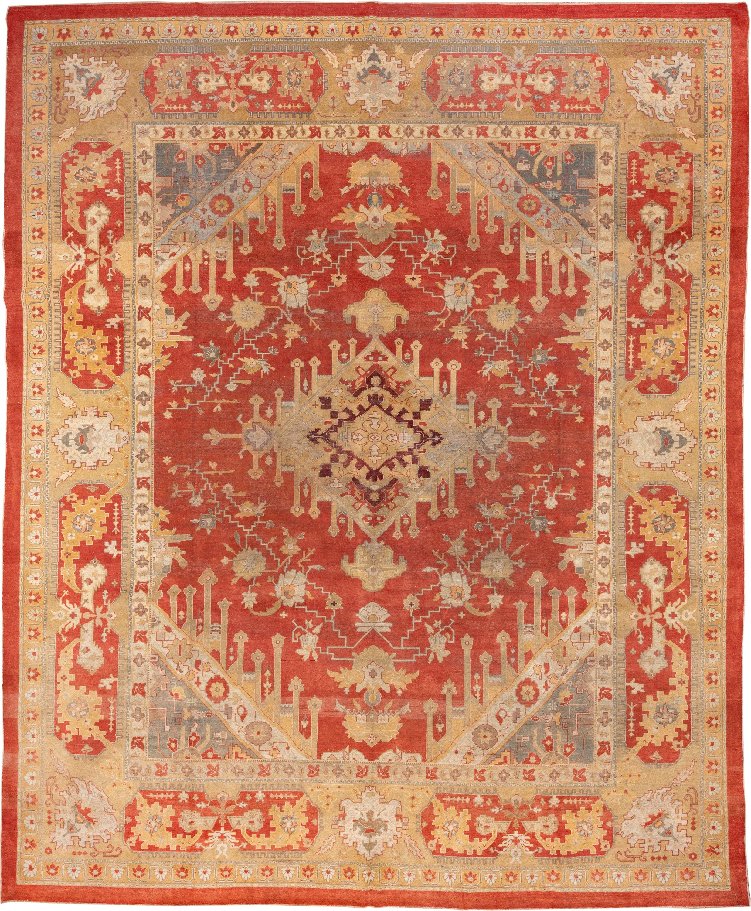 11' x 14' one-of-a-kind handmade antique Amritzar oversize rug. Color palette: terra cotta, camel, ivory, gold, slate, rust
