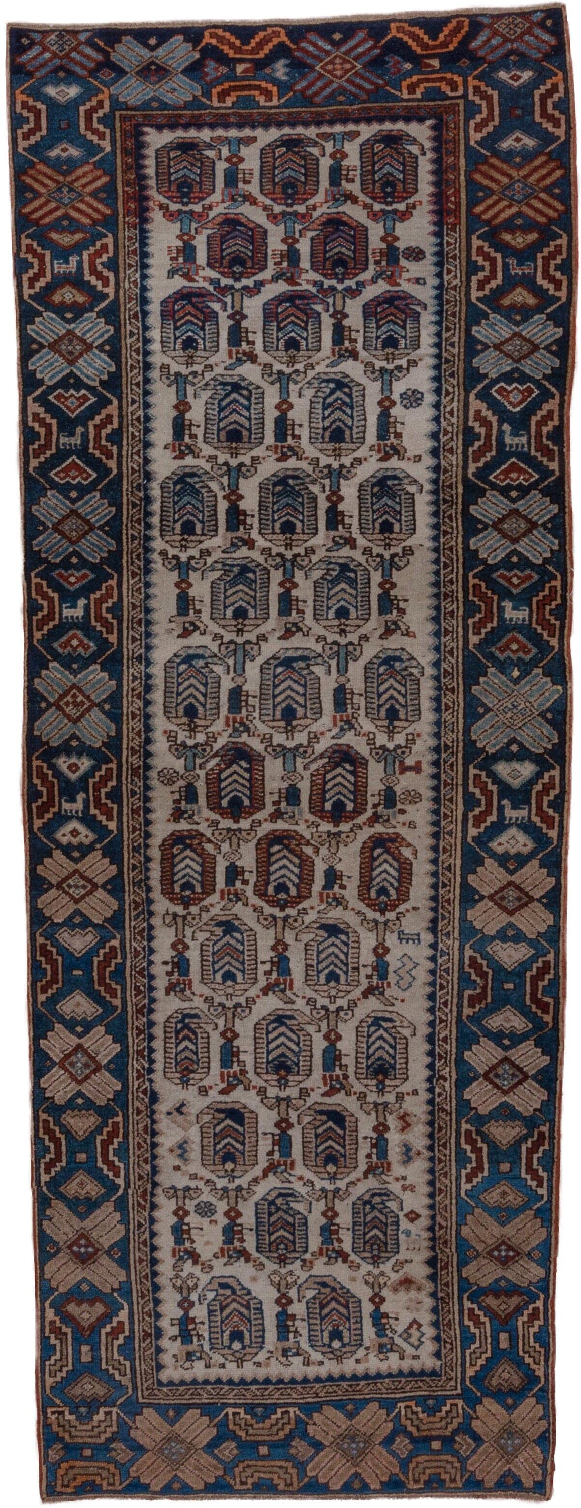3' x 9' one-of-a-kind handmade antique NW Persian runner rug. Color palette: ivory, indigo, camel, rust, slate, brown