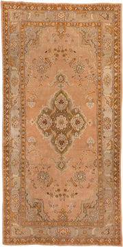 5' x 10' one-of-a-kind handmade antique Agra medium size rug. Color palette: peach, camel, ivory, taupe, gold, olive, brown