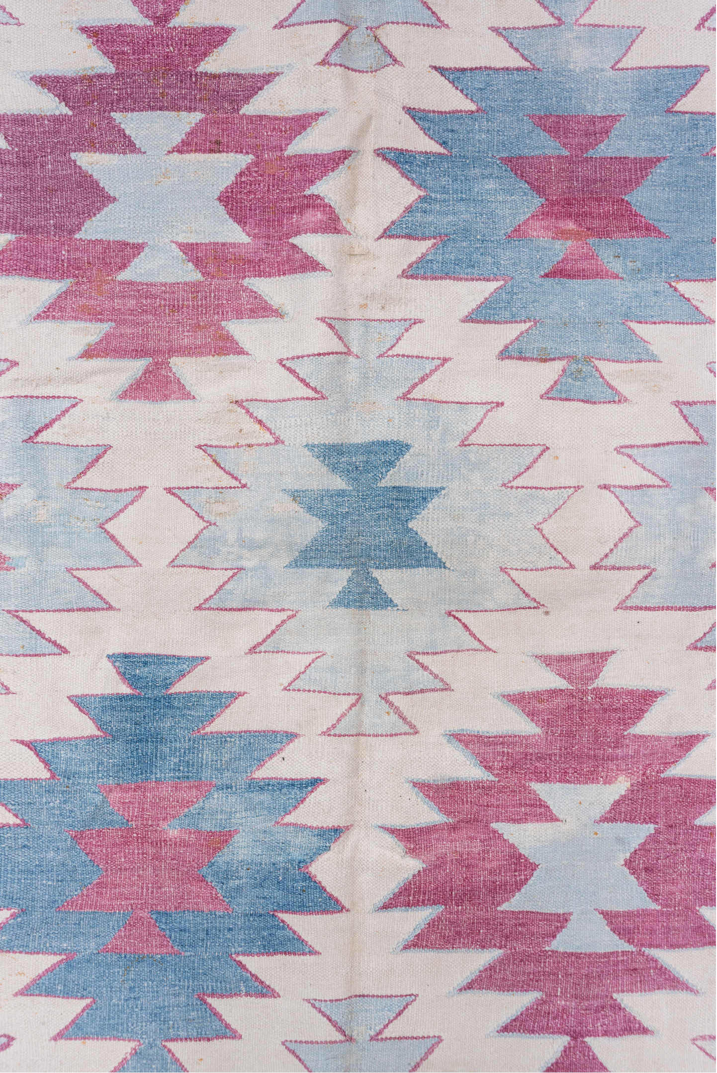 5' x 7' one-of-a-kind handmade antique Dhurrie rug. Color palette: ivory, sky blue, rose, dusty pink, light blue, pink, red