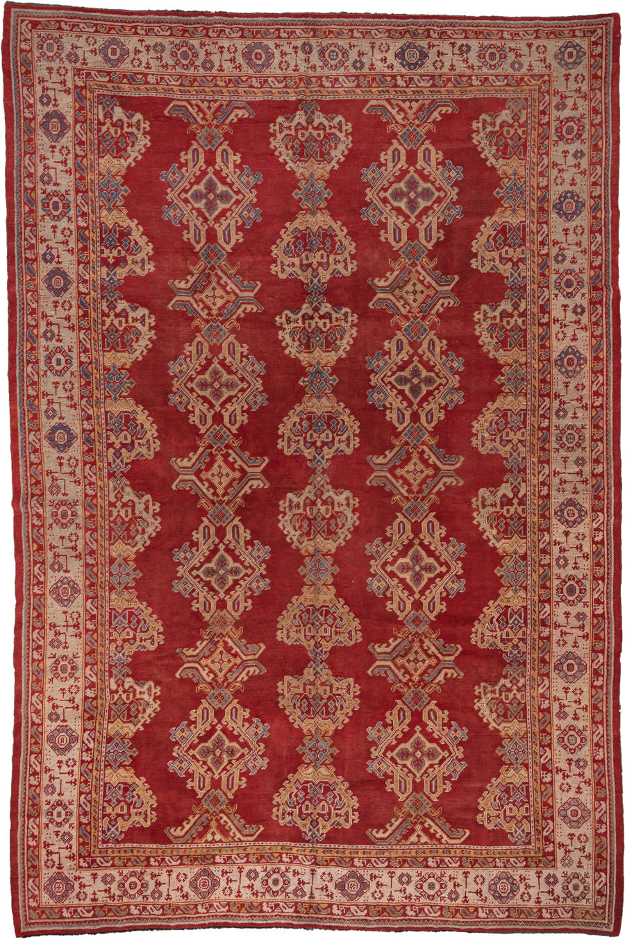 10' x 15' one-of-a-kind handmade antique Oushak rug. Color palette: rust, ivory, gold, blue, crimson, camel, terracotta
