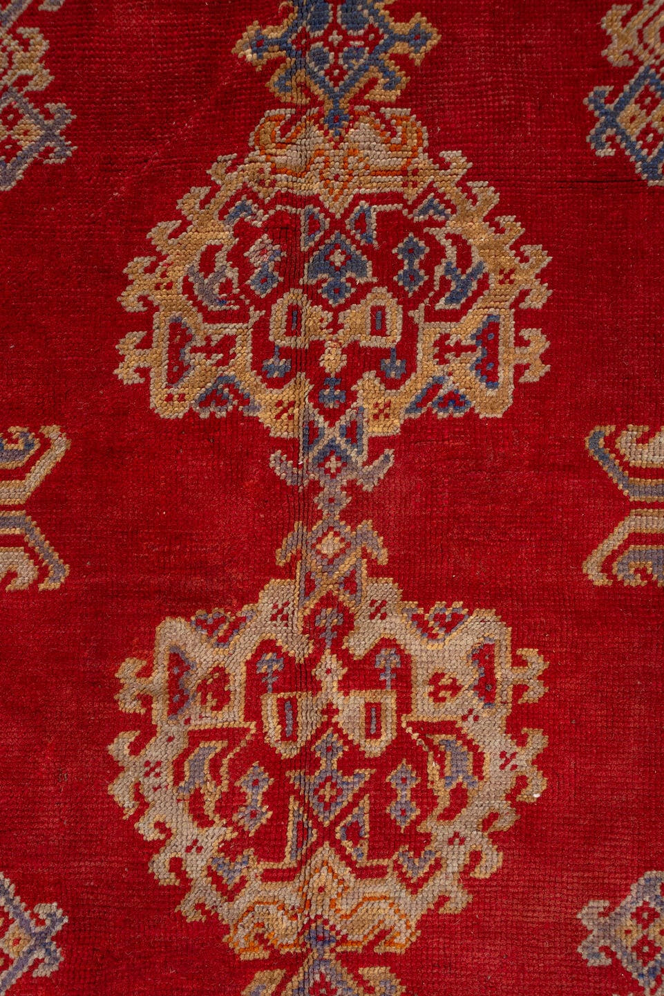 10' x 15' one-of-a-kind handmade antique Oushak rug. Color palette: rust, ivory, gold, blue, crimson, camel, terracotta
