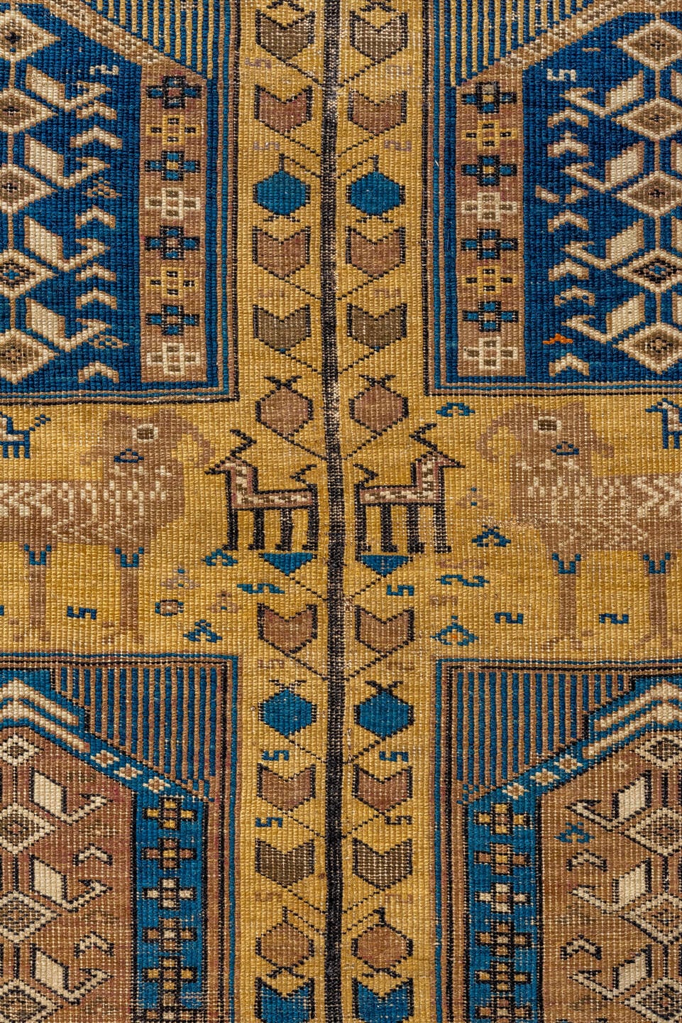 4' x 5' one-of-a-kind handmade antique Cabistan small size rug. Color palette: camel, brown, navy, ivory, taupe, charcoal