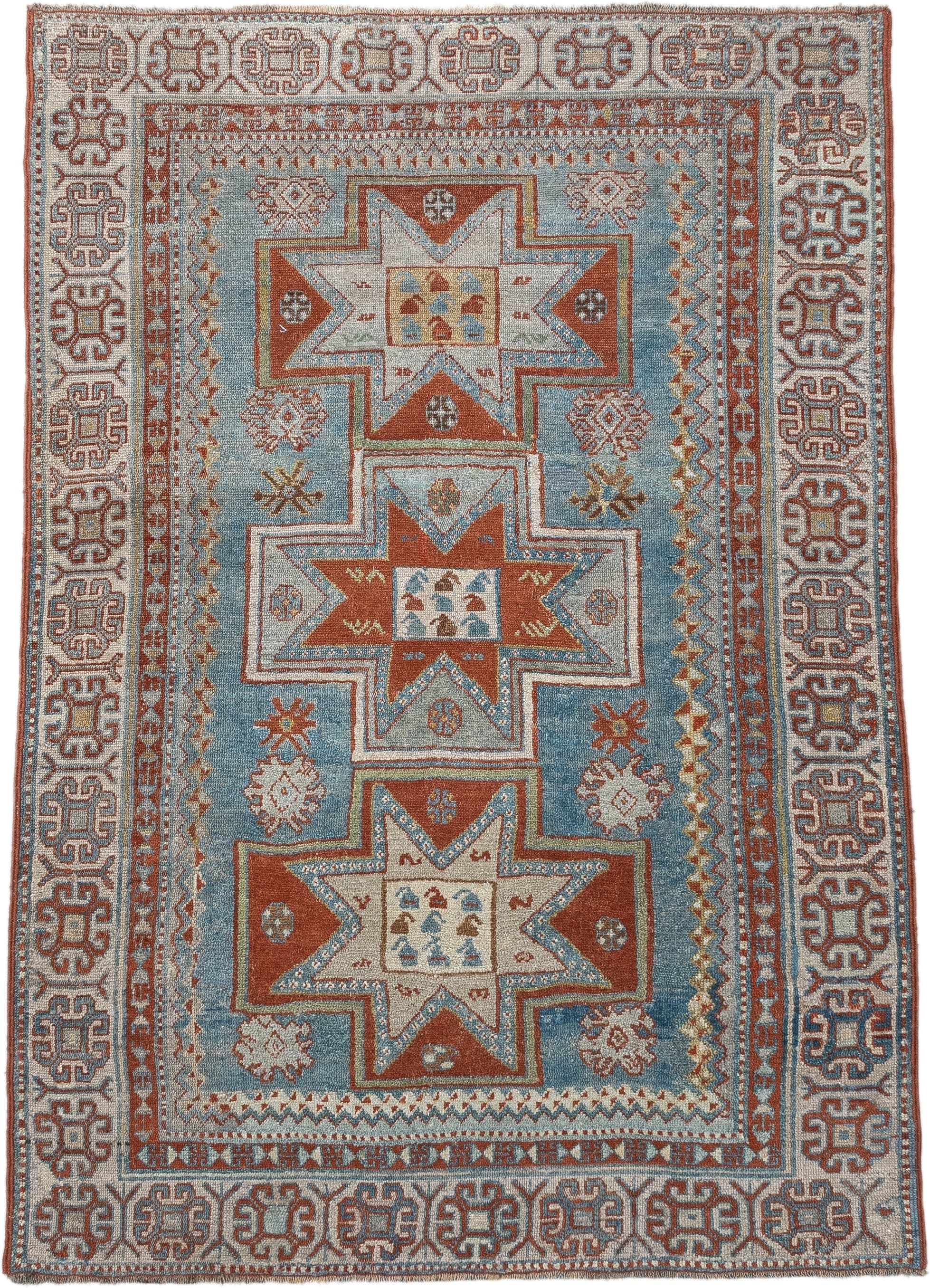 3' x 4' one-of-a-kind handmade antique Caucasian small size rug. Color palette: ivory, sky blue, rust, terra cotta, camel