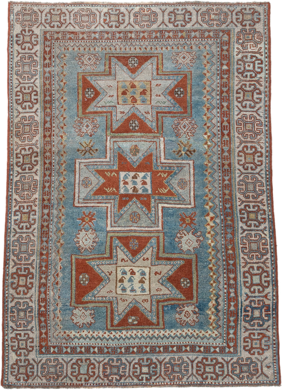 3' x 4' one-of-a-kind handmade antique Caucasian small size rug. Color palette: ivory, sky blue, rust, terra cotta, camel