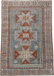 3' x 4' one-of-a-kind handmade antique Caucasian small size rug. Color palette: ivory, sky blue, rust, terra cotta, camel
