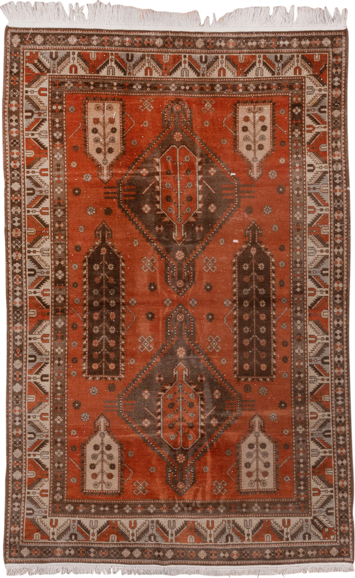 4' x 7' one-of-a-kind handmade vintage Caucasian rug. Color palette: terra cotta, ivory, brown, rust, taupe, charcoal, camel