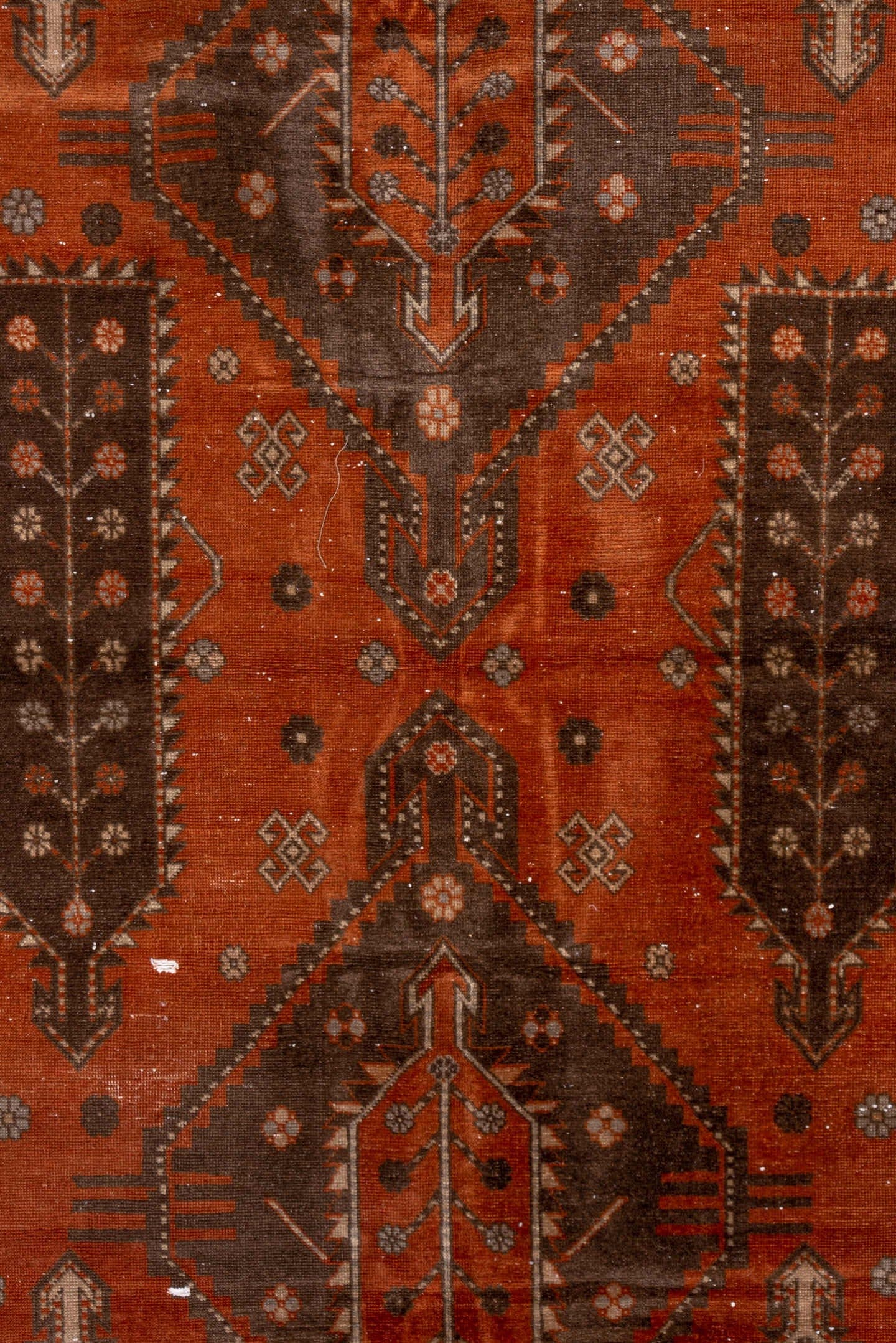 4' x 7' one-of-a-kind handmade vintage Caucasian rug. Color palette: terra cotta, ivory, brown, rust, taupe, charcoal, camel