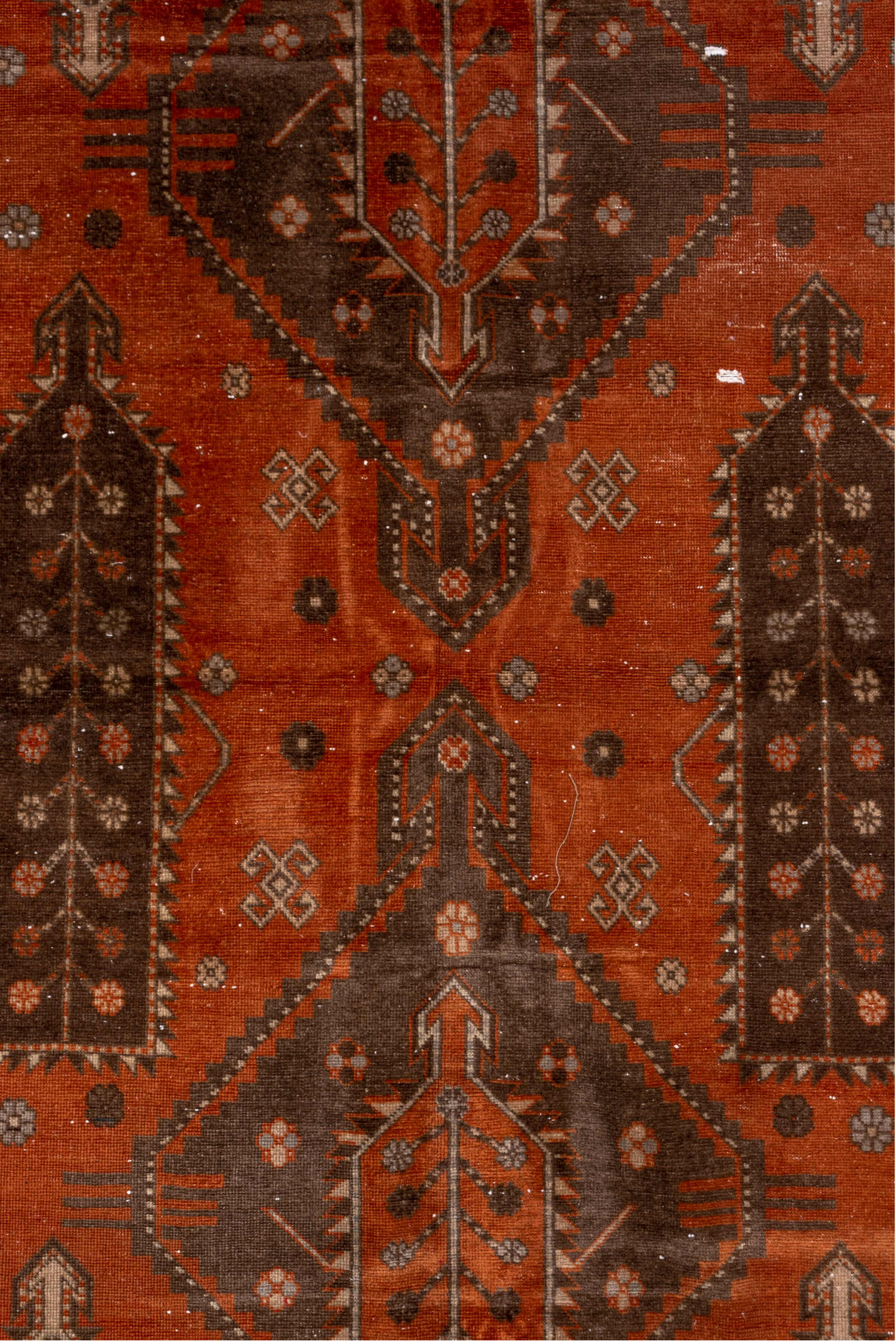 4' x 7' one-of-a-kind handmade vintage Caucasian rug. Color palette: terra cotta, ivory, brown, rust, taupe, charcoal, camel