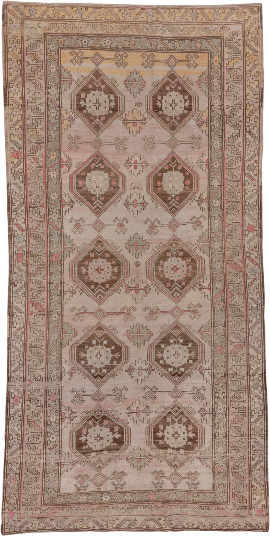 4' x 9' one-of-a-kind handmade antique Trans Caucasian runner rug. Color palette: ivory, taupe, brown, dusty_rose, camel