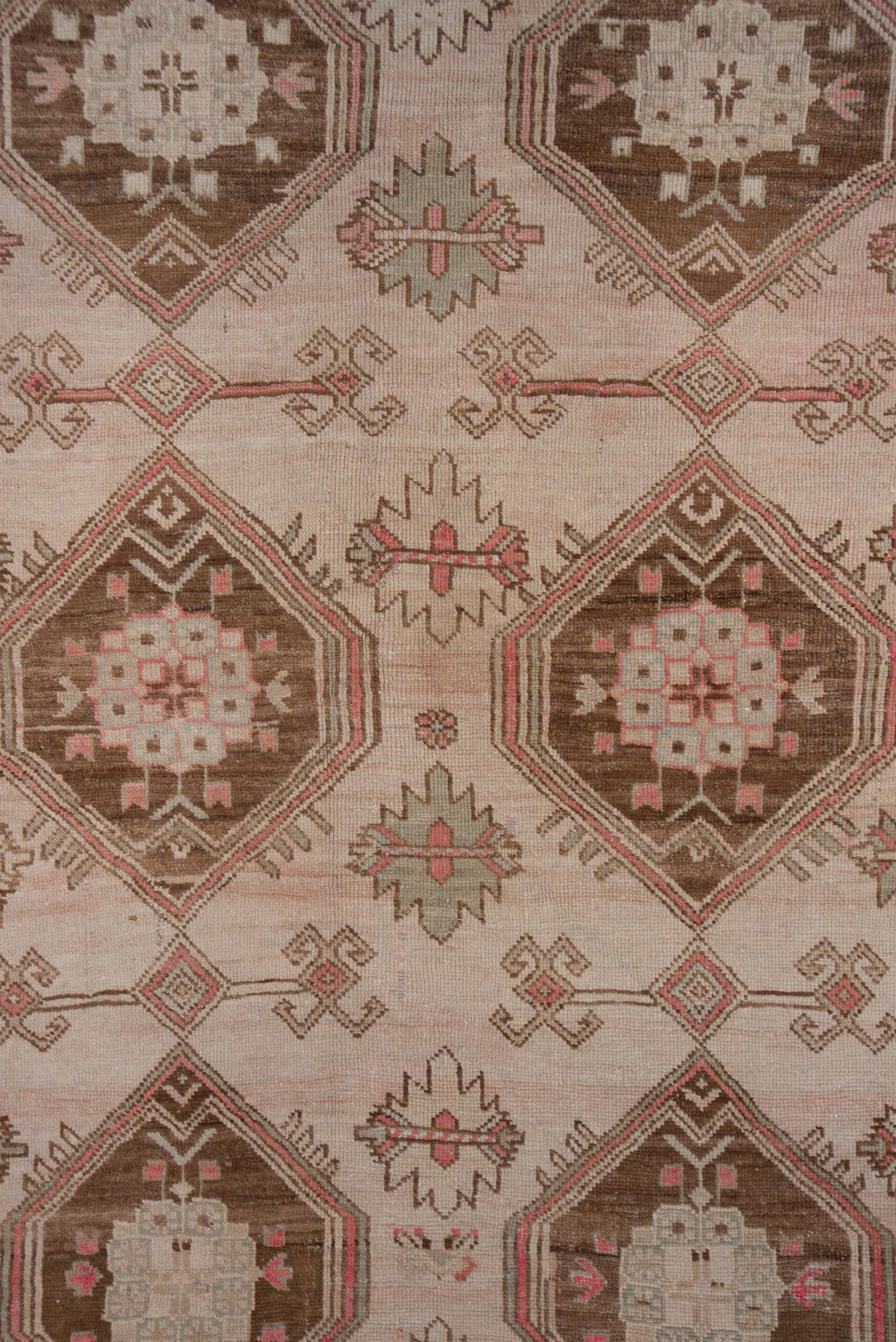 4' x 9' one-of-a-kind handmade antique Trans Caucasian runner rug. Color palette: ivory, taupe, brown, dusty_rose, camel