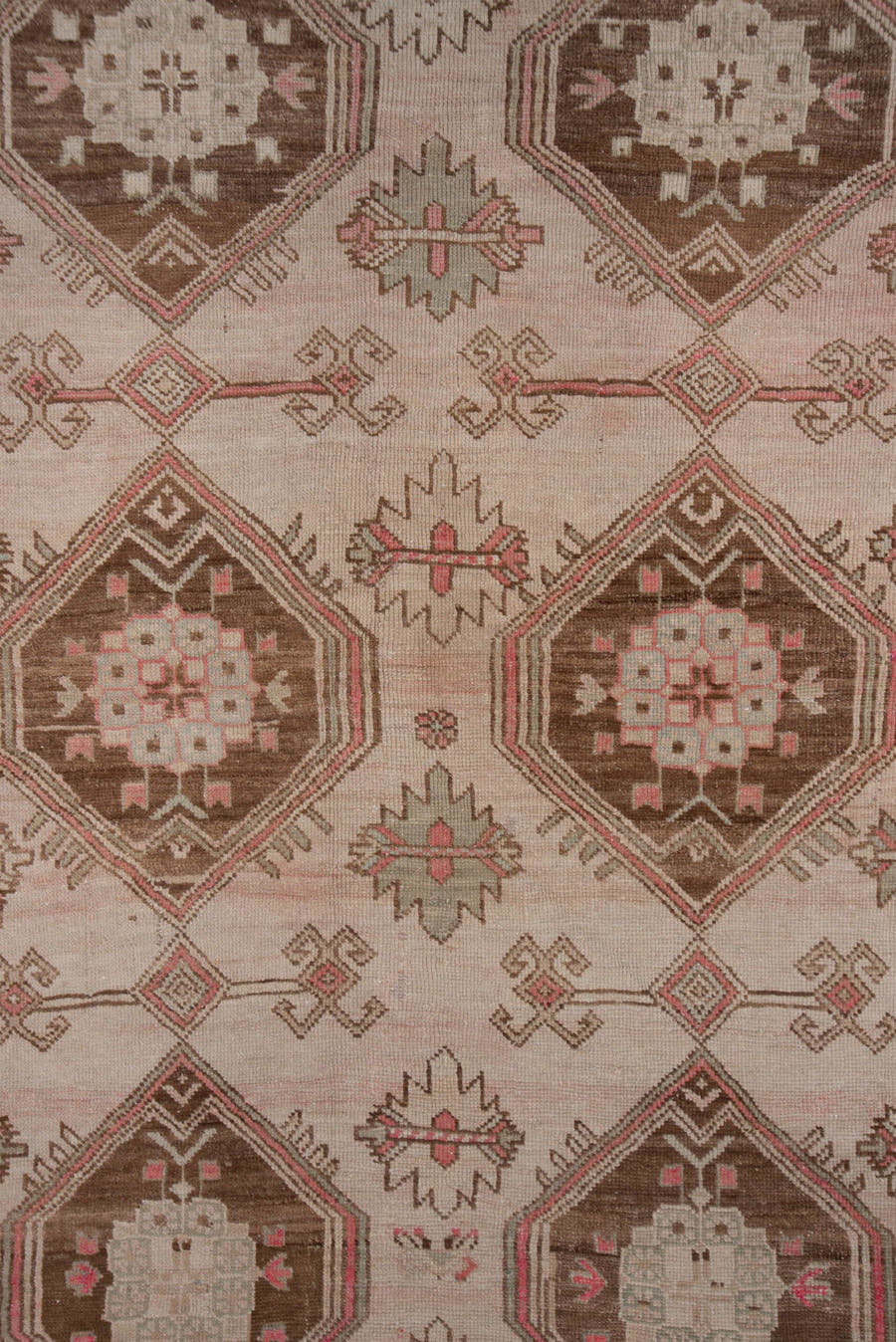 4' x 9' one-of-a-kind handmade antique Trans Caucasian runner rug. Color palette: ivory, taupe, brown, dusty_rose, camel