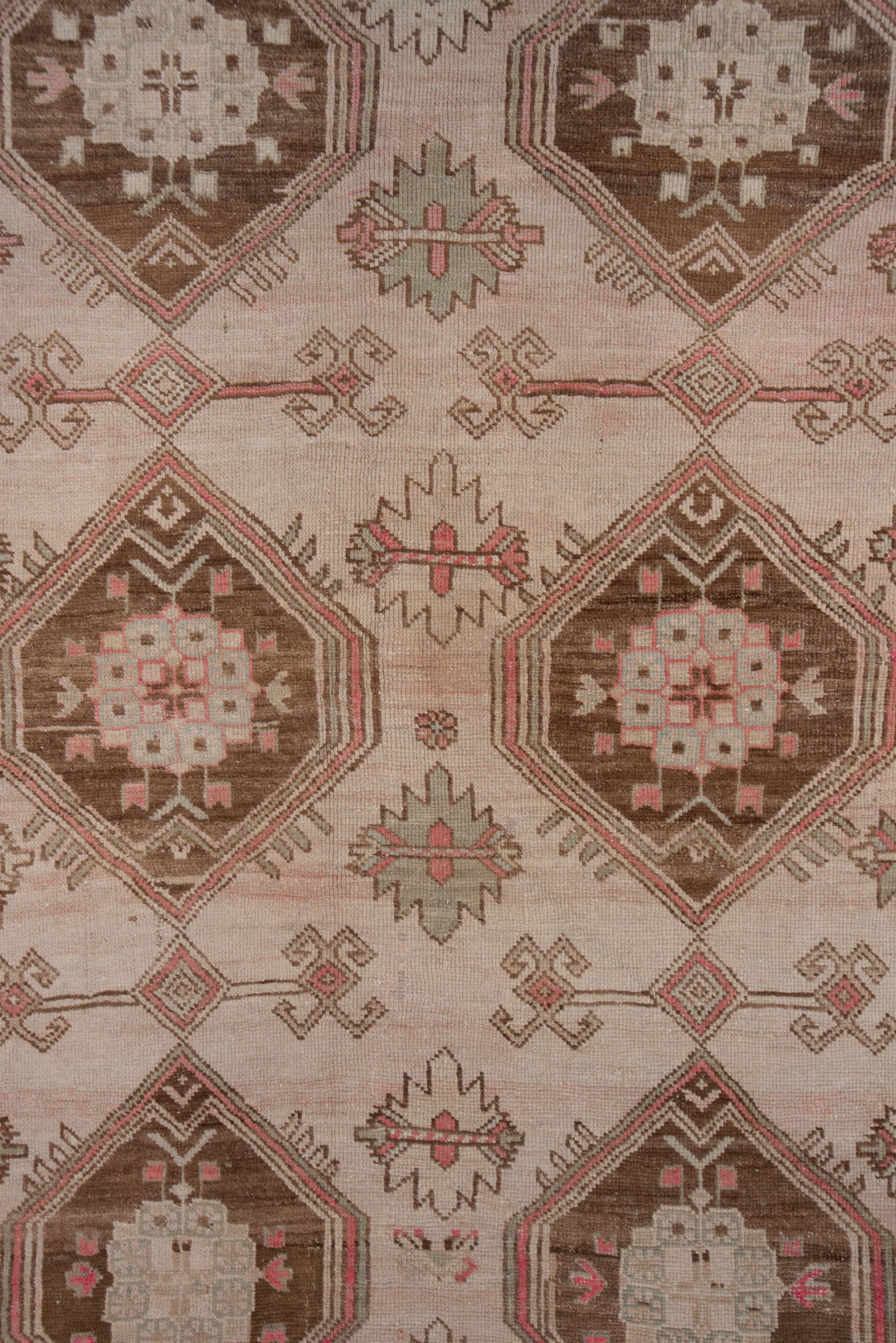 4' x 9' one-of-a-kind handmade antique Trans Caucasian runner rug. Color palette: ivory, taupe, brown, dusty_rose, camel