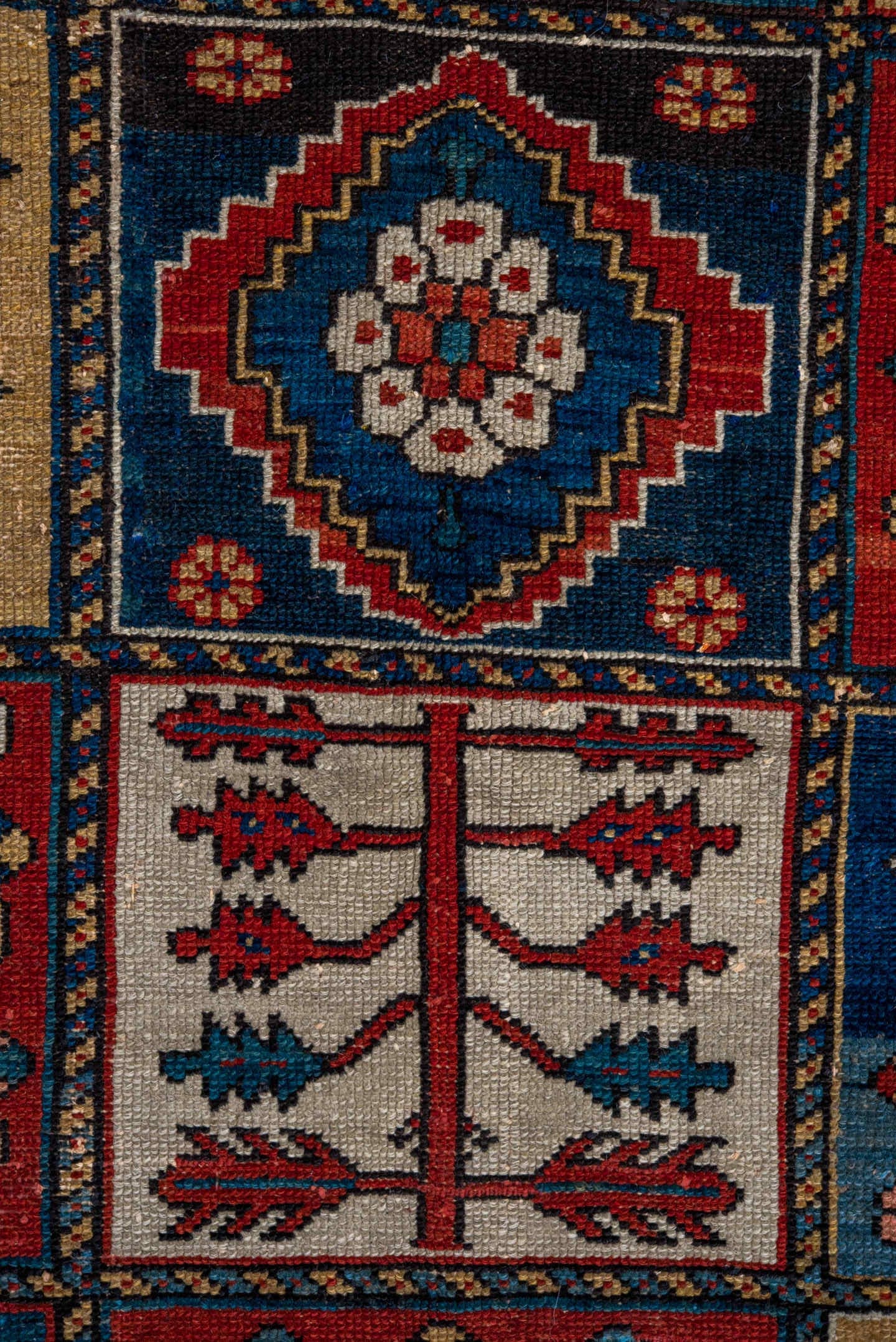 4' x 6' one-of-a-kind handmade antique Baktiary small size rug. Color palette: ivory, red, navy, sky_blue, rust, charcoal