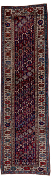 3' x 12' one-of-a-kind handmade antique NW Persian runner rug. Color palette: indigo, ivory, rust, sky blue, crimson, navy