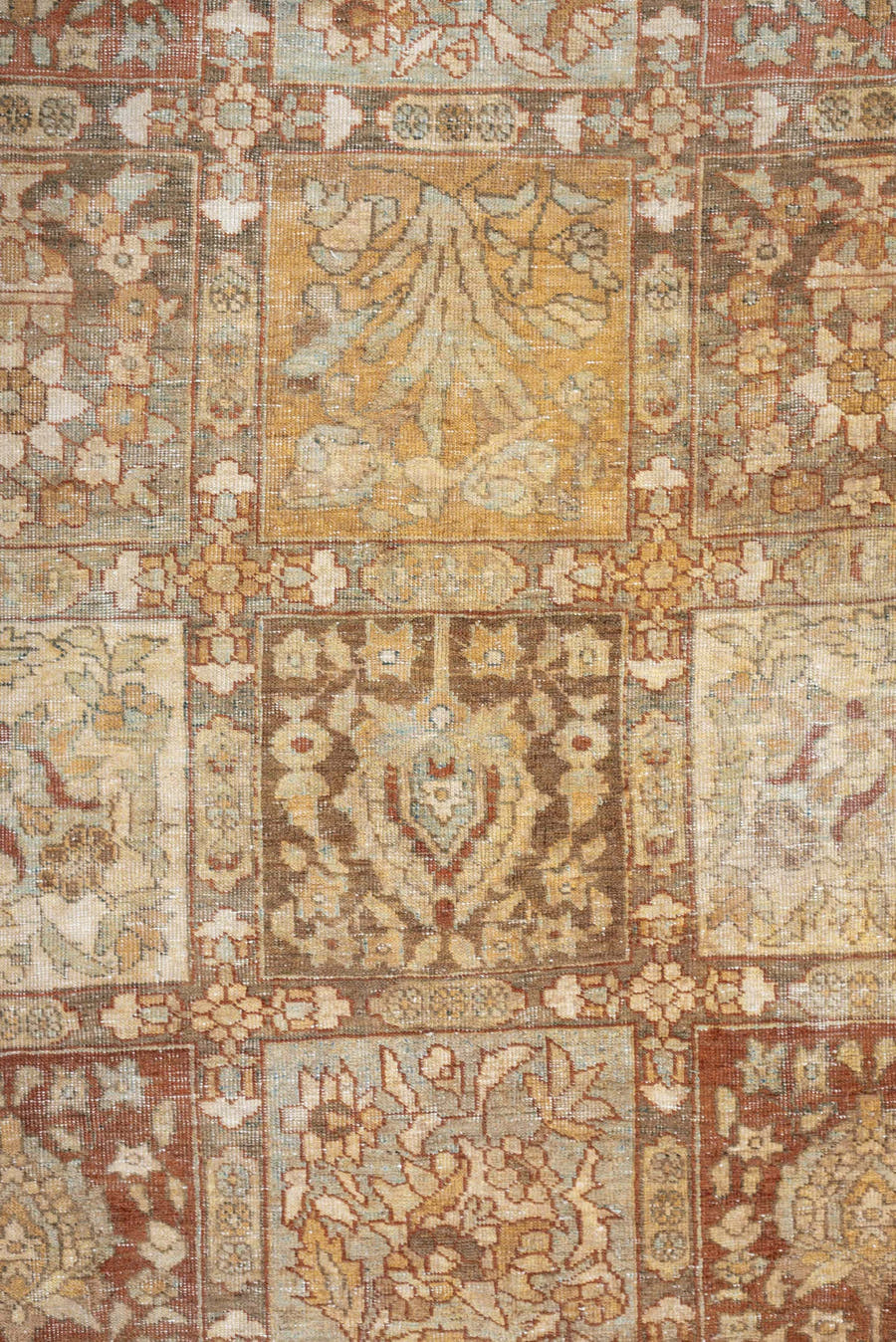 4' x 6' one-of-a-kind handmade antique Baktiary small size rug. Color palette: terracotta, ivory, pale blue, taupe, camel