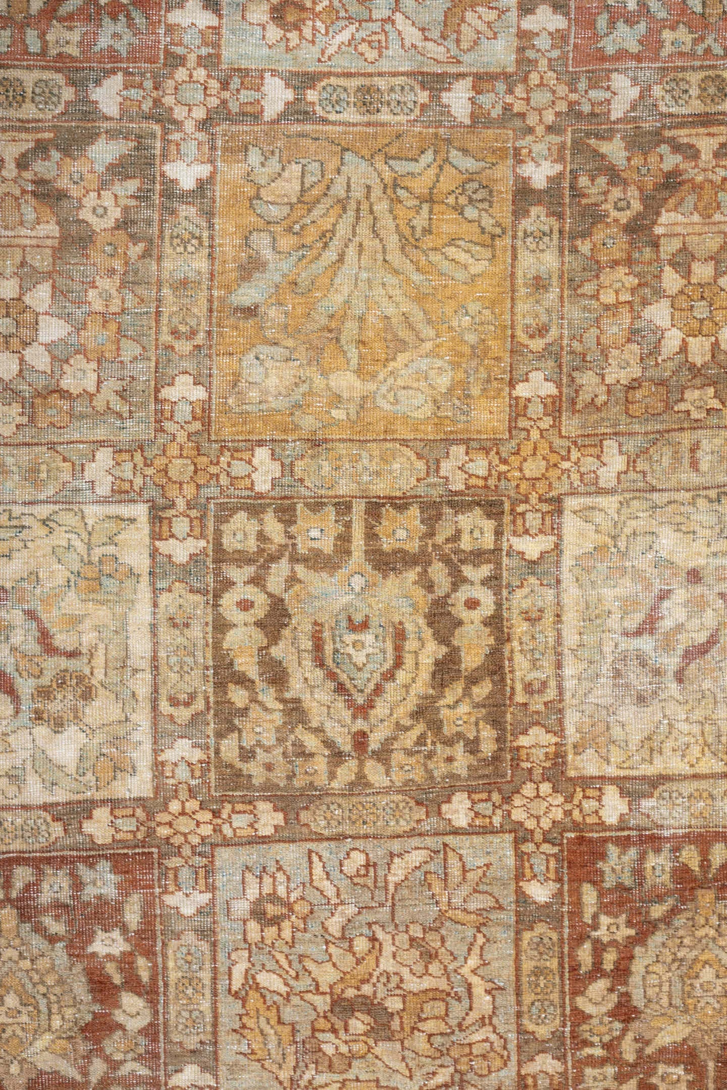 4' x 6' one-of-a-kind handmade antique Baktiary small size rug. Color palette: terracotta, ivory, pale blue, taupe, camel