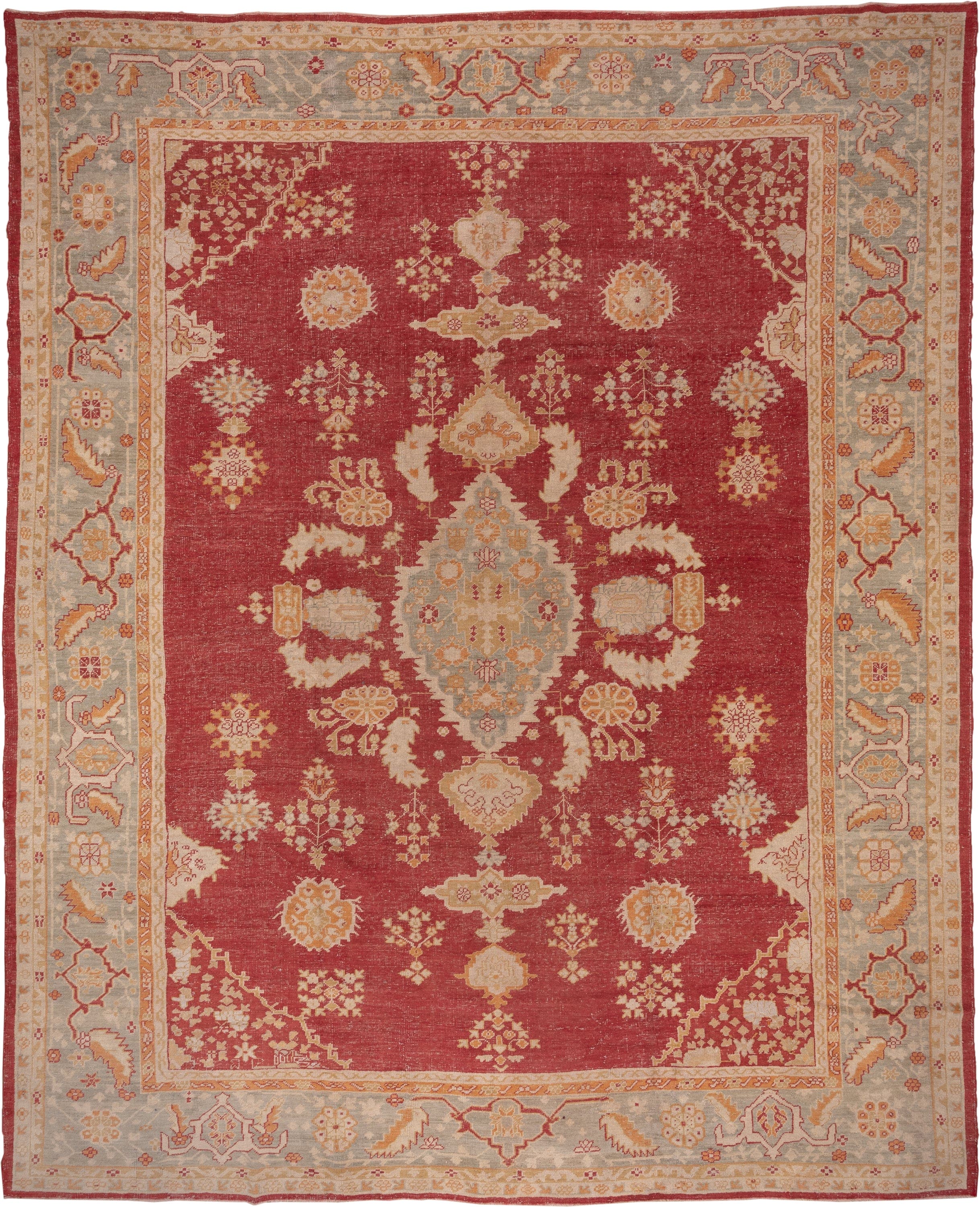 12' x 15' one-of-a-kind handmade antique Oushak oversize rug. Color palette: terracotta, pale blue, ivory, camel, rust, gold