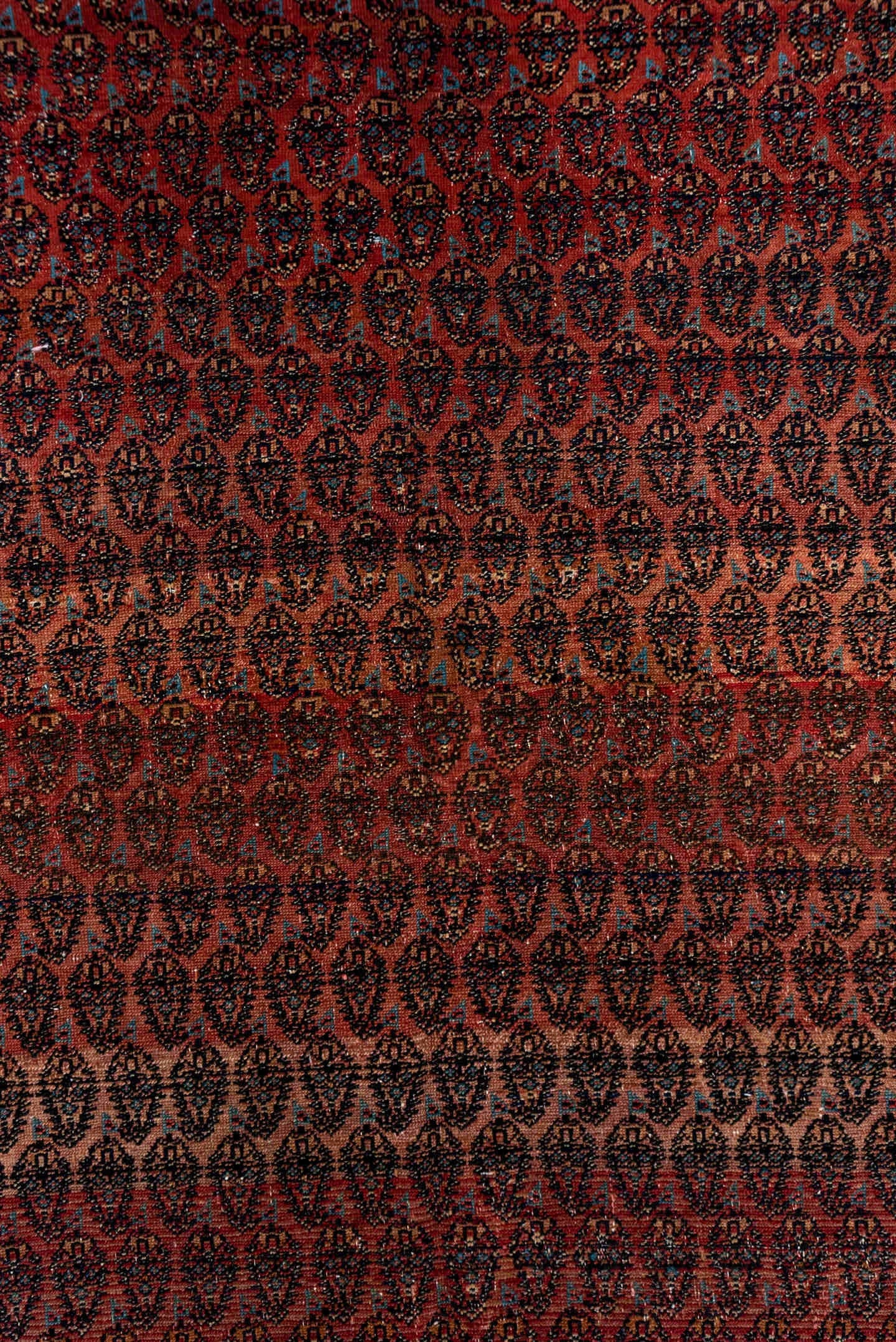 5' x 12' one-of-a-kind handmade antique Saraband rug. Color palette: rust, ivory, navy, burgundy, slate, rose, charcoal