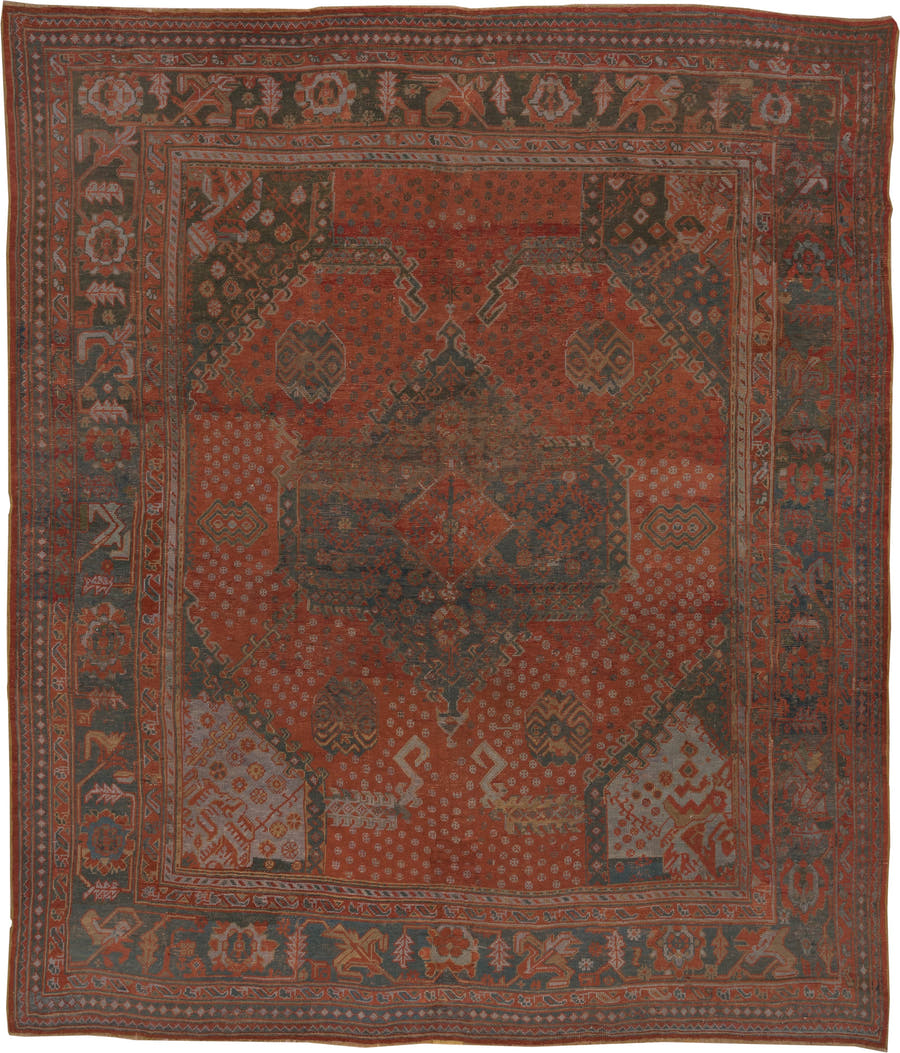12' x 14' one-of-a-kind handmade antique Oushak oversize rug. Color palette: terra cotta, charcoal, rust, slate, ivory, rose