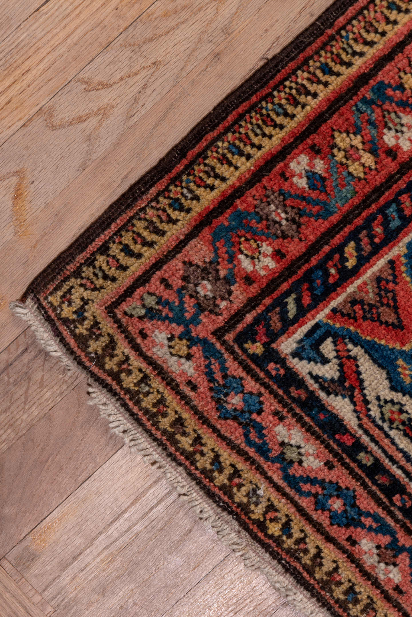 7' x 17' one-of-a-kind handmade antique Mahal rug. Color palette: navy, rust, ivory, coral, indigo, camel, burgundy, blue