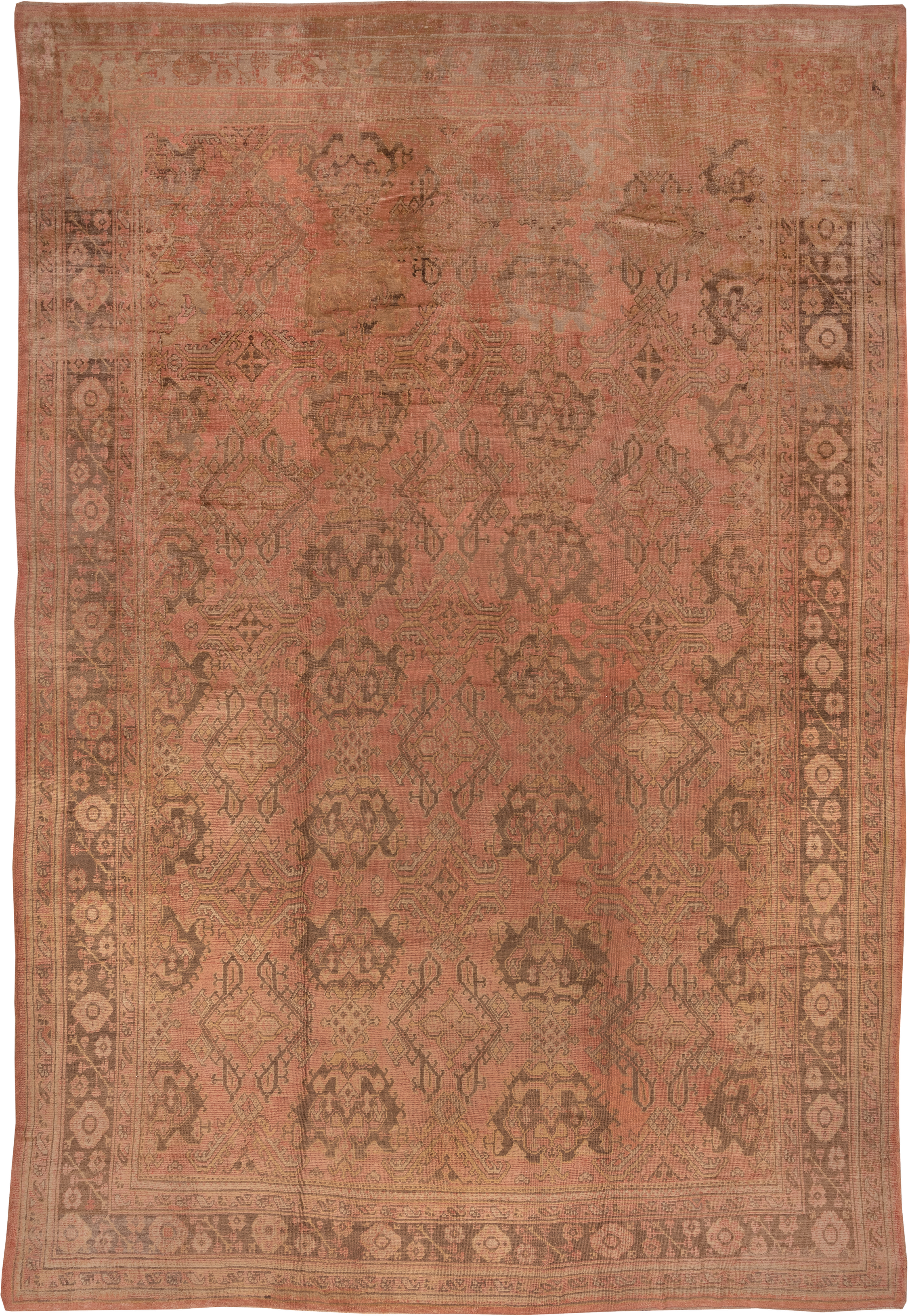 13' x 20' one-of-a-kind handmade antique Oushak oversize rug. Color palette: salmon, taupe, brown, beige, rose, camel, pink