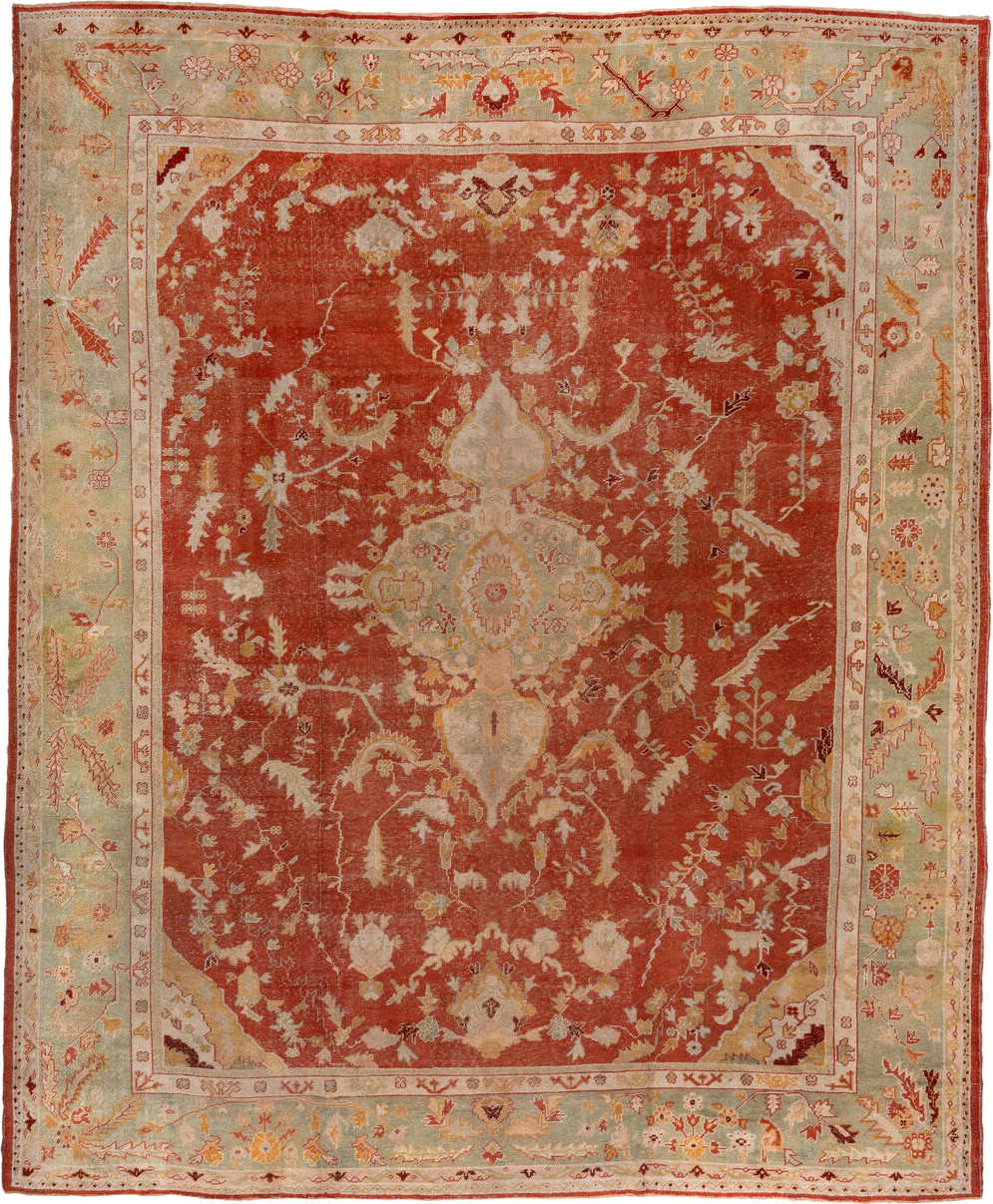 13' x 15' one-of-a-kind handmade antique Oushak oversize rug. Color palette: rust, ivory, sage, gold, terra cotta, beige